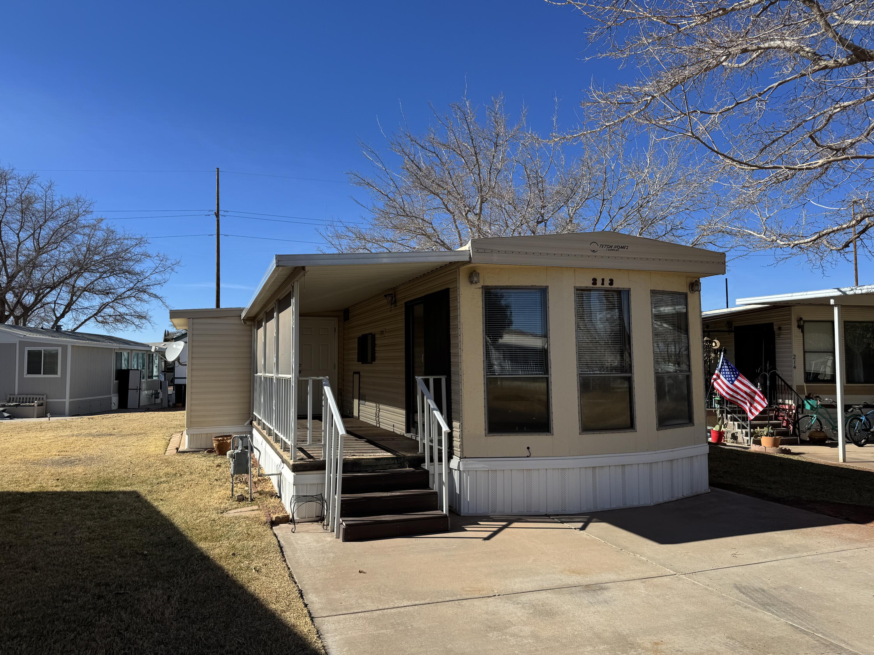 Charming 2-Bedroom Park Model in Sunny Southern Utah! This 2-bedroom, 1-bath home sits on an extra-large 0.09-acre lot with lots of windows and new blinds for natural light and privacy. New washer & dryer. Enjoy the covered back patio with a connected shed and a welcoming front porch. Located in a fun, active community with great amenities. Just added new stack washer/dryer. Don't miss this perfect getaway or full-time home--schedule your showing today! Buyer to verify all information.  Listing agent has a few staging items that will not be included in the sell.