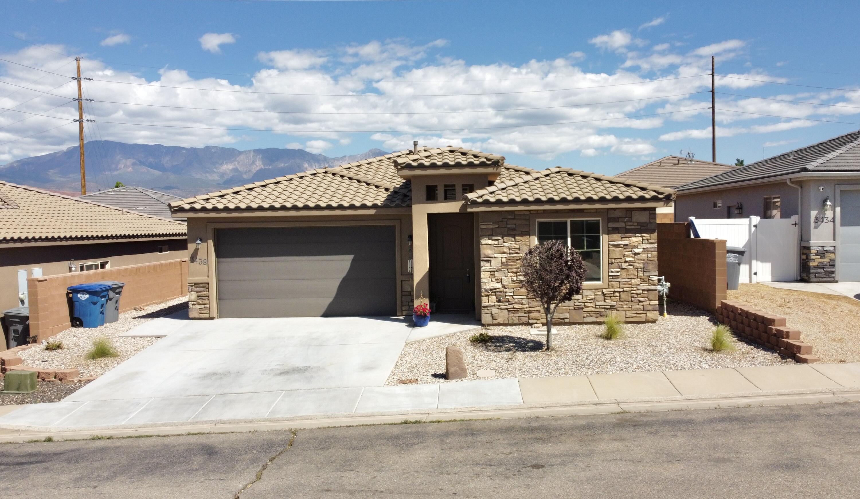 Welcome to your slice of Southern Utah paradise! This beautifully located home at 3438 W 150 N in Hurricane offers the perfect blend of comfort, convenience, and adventure. Featuring 3 spacious bedrooms, 2 bathrooms, and a heated/Cooled 2-car garage, this home is ideal for those seeking easy living in a stunning natural setting. The functional layout provides comfortable living spaces, perfect for both relaxing and entertaining. Situated in the heart of scenic Southern Utah, you'll be just minutes from the breathtaking landscapes of Zion National Park, with easy access to the gateway destinations of Bryce Canyon National Park and Grand Canyon National Park. Whether you love hiking, biking, or simply soaking in the views, this location puts it all within reach. Commuters and travelers will appreciate the close proximity to the Interstate I-15 corridor, making trips to nearby cities, dining, and shopping incredibly convenient. If you've been searching for a home that offers both everyday comfort and access to world-class outdoor recreation, this Hurricane gem is one you won't want to miss!