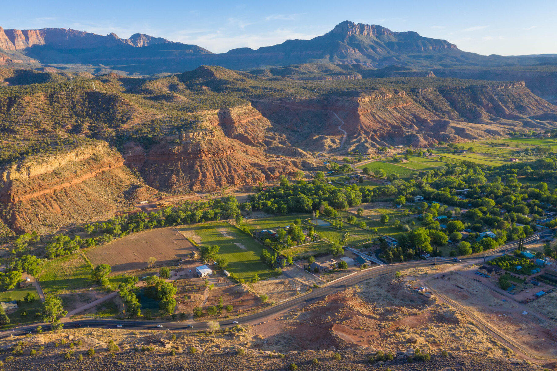 RARE multi-acre a parcel on the east end of Rockville just minutes from the red rock playground of Zion National Park. Stunning Views of red rocks and the green Virgin River valley. Can be subdivided into 2-residential building lots with 2-Rockville water hook-ups and plenty of extra space and elbow room! Great investment or building lot for your home and a Guest House, or subdivide and sell the 2nd lot. Not zoned for commercial or nightly rentals.