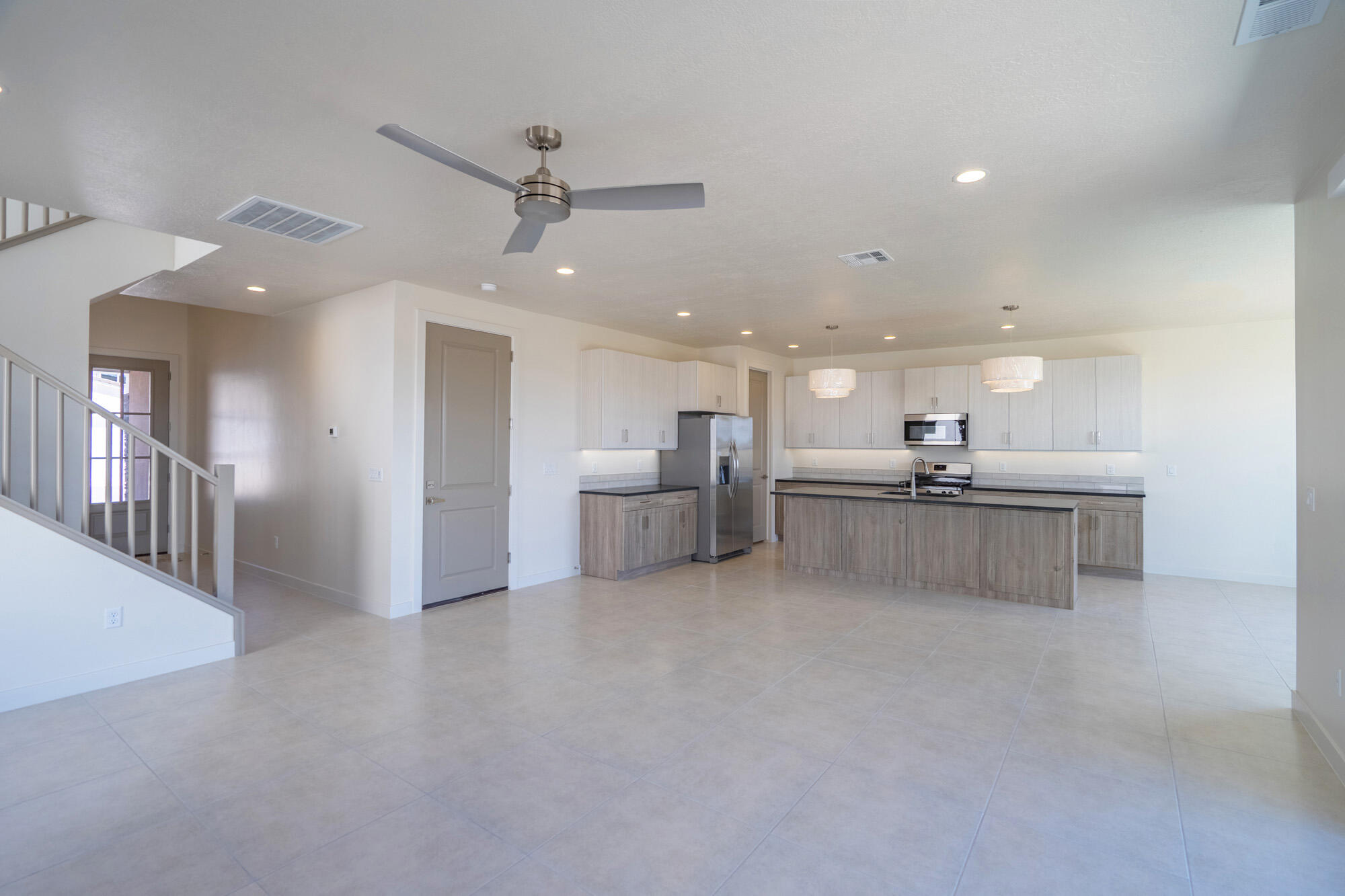 The Strata - This well-designed 3-bedroom, 2-bath home home offers modern living with an open-concept layout connecting the spacious great room and stylish kitchen. Features include thermofoil cabinetry, granite countertops, a single-bowl stainless steel undermount sink, and a Frigidaire stainless steel appliance package with electric range, microwave hood, dishwasher, and refrigerator. Interior finishes include two-tone paint, tile or LVP carpet in main living areas, and bedrooms, can lighting throughout, and ceiling fans in the living room and bedrooms. Bathrooms feature Moen plumbing fixtures and custom tiled showers/tub surrounds. Additional highlights include a laundry room with sink cabinet, with 50-amp EV breaker and room for a workshop or toys, block walls, and backyard space. Community amenities include a pool, hot tub, pool house, pickleball court, playground, and RV parking.Images are for illustrative purposes only and may depict a mirrored floor plan. Exterior and interior colors, finishes, materials, features, and upgrades shown may vary from the completed home. Please consult the builder or listing agent for current specifications and available options.
Builder incentives available with preferred lender. Qualified buyers may obtain: • Conventional 7/6 ARM - initial interest rate ~5.50% on an adjustable-rate mortgage (ARM), fixed 7 yrs, adjusts semiannually • FHA 5/1 ARM - initial interest rate ~4.75% on an adjustable-rate mortgage (ARM), fixed 5 yrs, adjusts annually Seller contributes 2.5% + lender contributes 1.5% (with Guild Mortgage), which may be used toward a temporary rate buydown, closing costs, and/or prepaids--reducing initial monthly payments. Lender Incentives available only when financing is obtained through Matt Hickman at Guild Mortgage.OAC. Rates subject to change. APR may be higher.