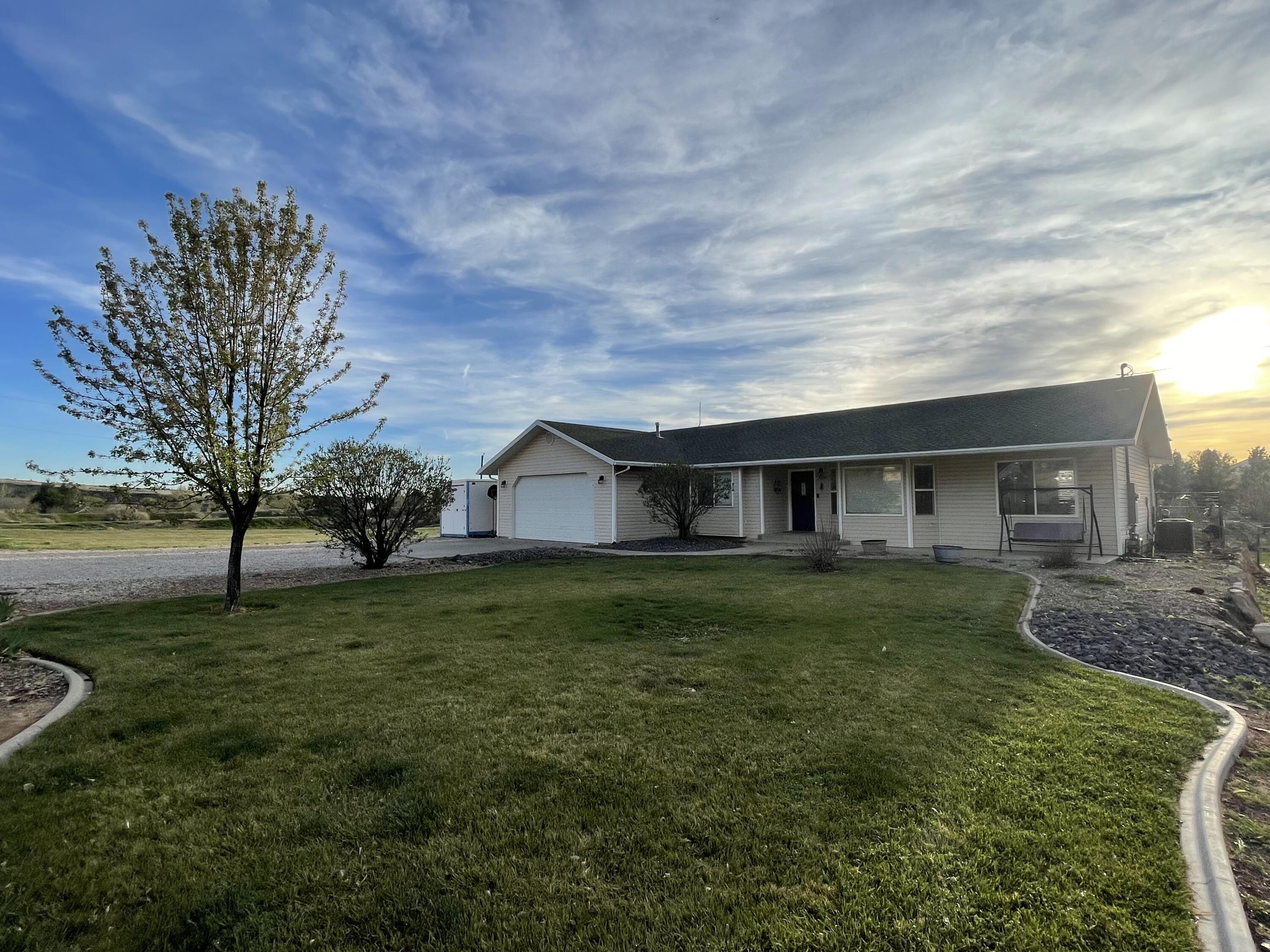 One of the best-value opportunities in the area! This beautifully updated, move-in-ready home is located in a highly desirable neighborhood and offers space, privacy, and room to breathe. The open-concept layout features a remodeled kitchen, fresh paint, and bright, comfortable living spaces. Outside, enjoy a large grass backyard, fruit trees, grape vines, blackberries, large shade trees, room to park toys, RV hook-ups, horse privileges, and an open field next door that will never be developed.