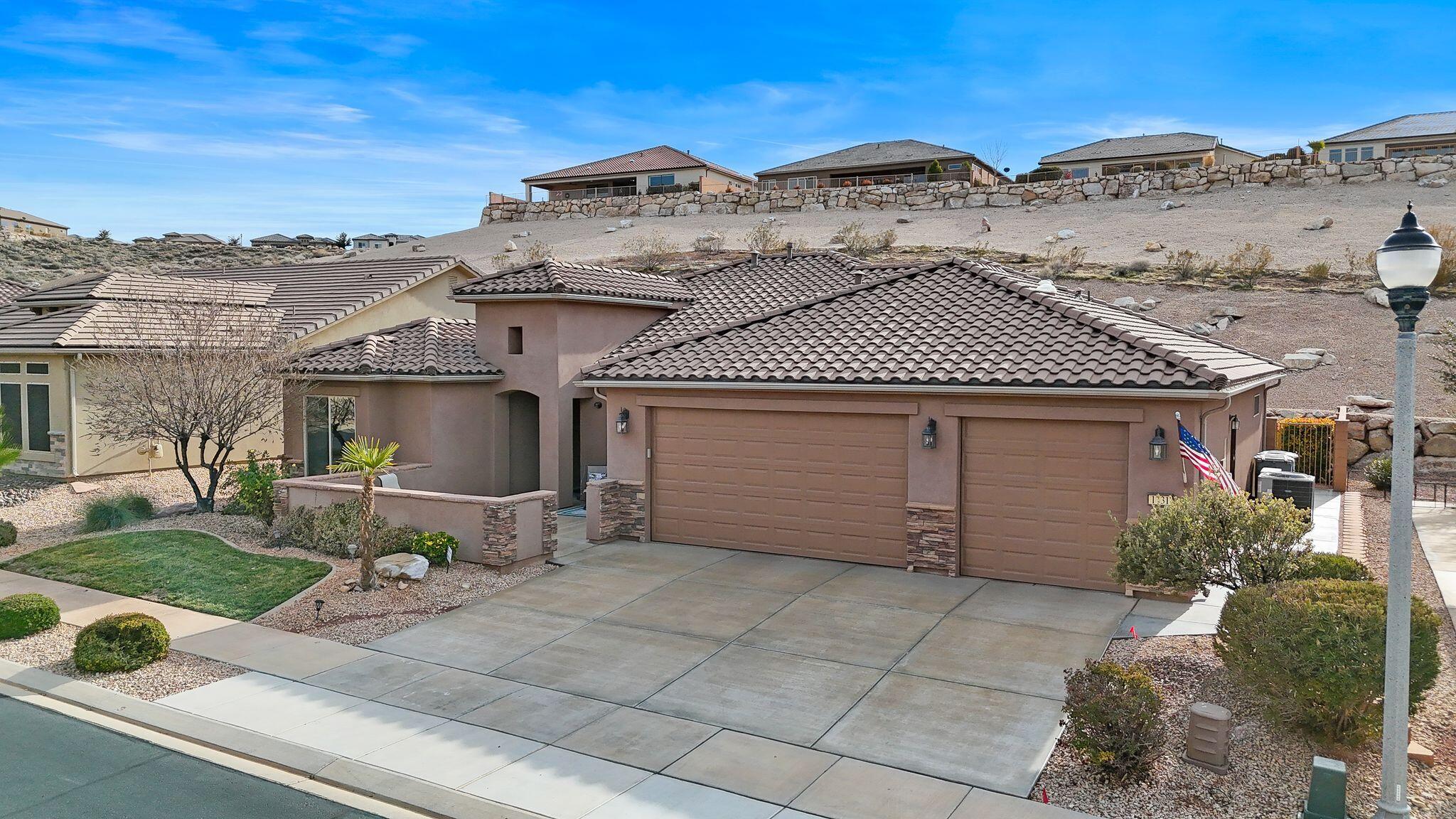 Welcome to SunRiver luxury living! This bright and airy home features a spacious front courtyard, an open-concept living area, built-ins, and a dedicated office. The kitchen features granite countertops and stainless steel appliances. Washer and dryer are included. The primary suite includes a walk-in shower and a generous walk-in closet. There is a large climate-controlled 4-car garage with a separate storage room and its own mini-split. Enjoy modern comforts, including top-down/bottom-up blinds and remote-controlled electric shades. The backyard opens to a common area, creating a sense of openness, privacy, and spaciousness. Perfect for relaxed desert living. Furniture Package Available!