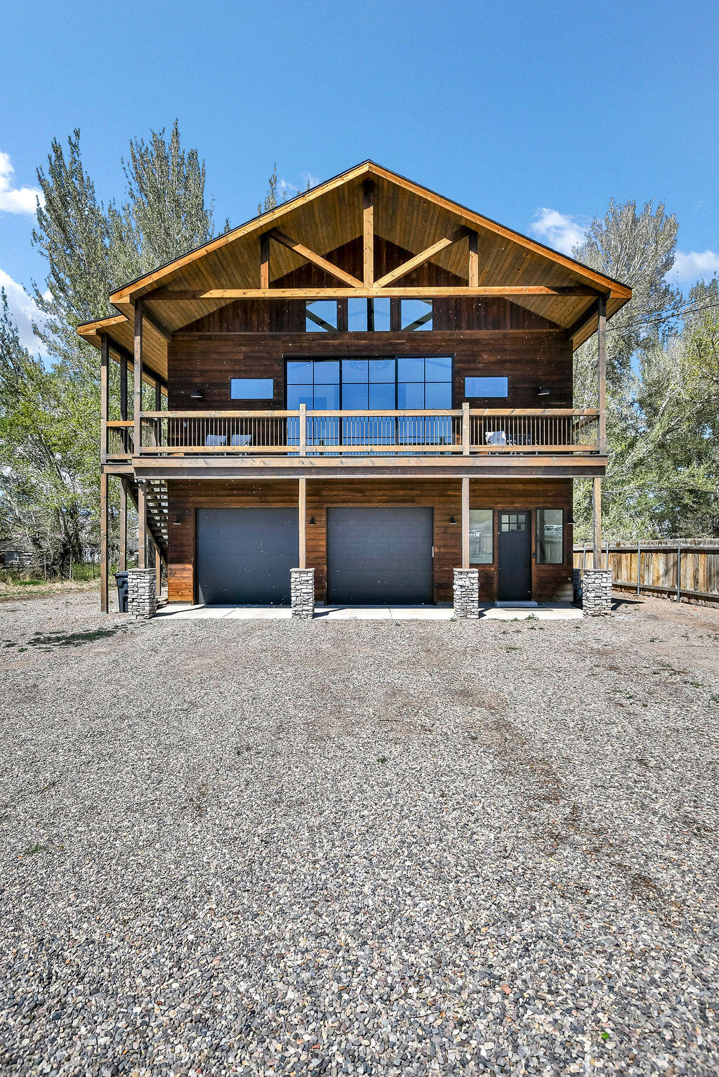 Tucked away at the end of the street in the peaceful setting of Annabella, UT this stunning 2 bedroom, 2 bathroom retreat offers the perfect blend of luxury, privacy, and strong investment potential. Situated on 1.37 acres with valuable irrigation water and livestock rights, this property is ideal for those looking to generate income now while building their long-term vision. Step inside the 1,771Sq. Ft home and experience an open-concept design filled with high-end finishes and natural light. The kitchen features beautiful granite countertops, while the living room is anchored by a striking gas log fireplace with floor-to-ceiling stone creating a true statement piece and warm, inviting atmosphere. The primary bedroom offers its own cozy electric fireplace, adding an extra layer of comfort and luxury. Every room is designed to maximize the setting, featuring oversized sliding glass doors that open to private balconies surrounded by quaking aspen trees, providing a peaceful, secluded feel. Enjoy three spacious decks, wired for a hot tub, and unwind in your private sauna for the ultimate relaxation experience. The property also includes an oversized garage and dedicated RV parking with power hookups. Currently operating as a successful nightly rental, this home is a proven income-producing asset with even greater upside. With ample acreage and layout potential, there is room to expand the existing structure making it an exceptional opportunity to create a larger estate or luxury retreat. Whether you're seeking a high-performing investment, a private getaway, or a property with room to grow into a custom estate, this one offers versatility, privacy, and long-term value. Located just minutes from scenic mountain trails, this property provides easy access to hiking, ATV riding, and endless outdoor adventure-making it just as appealing for personal enjoyment as it is for guests and renters.