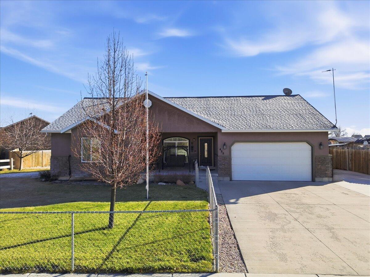 Welcome to this well maintained and thoughtfully designed home offering space, comfort, and an ideal location. This fully finished residence features 5 bedrooms and 2¾ bathrooms and sits on a generous .38-acre fully fenced lot, providing both privacy and room to enjoy the outdoors. As you enter the home, you are greeted by vaulted ceilings that create an open and welcoming atmosphere in the main living areas. The home offers formal living rooms on both the main level and the basement, making it perfect for entertaining, multi-generational living, or simply enjoying separate gathering spaces. The layout is functional and spacious, allowing for flexibility to meet a variety of lifestyle needs. The kitchen is warm and inviting, complete with ample cabinetry and a china hutch that will stay with the home, adding character and practical storage. Downstairs, the fully finished basement provides additional living space and features a cozy wood stove, creating a comfortable retreat during the colder months. A dedicated food storage room adds valuable space for organization and long-term storage. Outside, the property truly shines. The fully fenced yard offers a safe and private area for pets, play, or entertaining. Enjoy the mature landscaping and established fruit trees, including two apple trees, two pear trees, and two plum trees, perfect for homegrown harvests. A storage shed provides extra space for tools, equipment, or hobbies, while the two-car garage offers convenient parking and additional storage. This home is ideally situated within walking distance to the elementary, middle, and high schools, making it an excellent choice for families. With its generous lot size, finished living spaces, and desirable neighborhood location, this property offers a rare combination of comfort, functionality, and convenience. Don't miss the opportunity to own this well-maintained home. Square footage figures are provided as a courtesy estimate only and were obtained from Sanpete cou