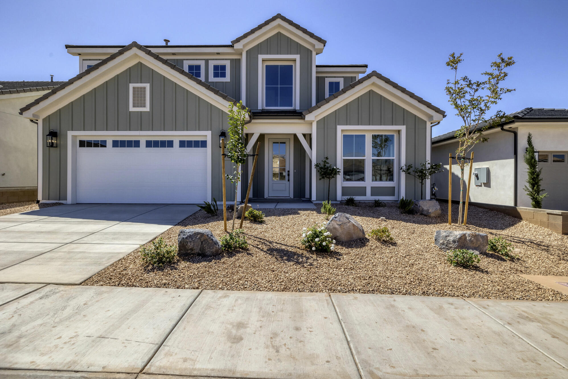 Beautiful Ivory Home located in the desirable Avenidas at Hidden Valley community! This well-designed home features 4 spacious bedrooms, 2.5 bathrooms, and a 2-car garage with an open and functional floor plan perfect for everyday living and entertaining. The bright kitchen flows seamlessly into the main living area and dining space, while large windows provide abundant natural light throughout the home. Upstairs offers generously sized bedrooms including a comfortable primary suite with ensuite bath and walk-in closet. Enjoy low-maintenance living in a great location close to parks, trails, shopping, schools, and all that St. George has to offer. A fantastic opportunity in one of the area's growing communities!  Ask about our preferred lender incentive.