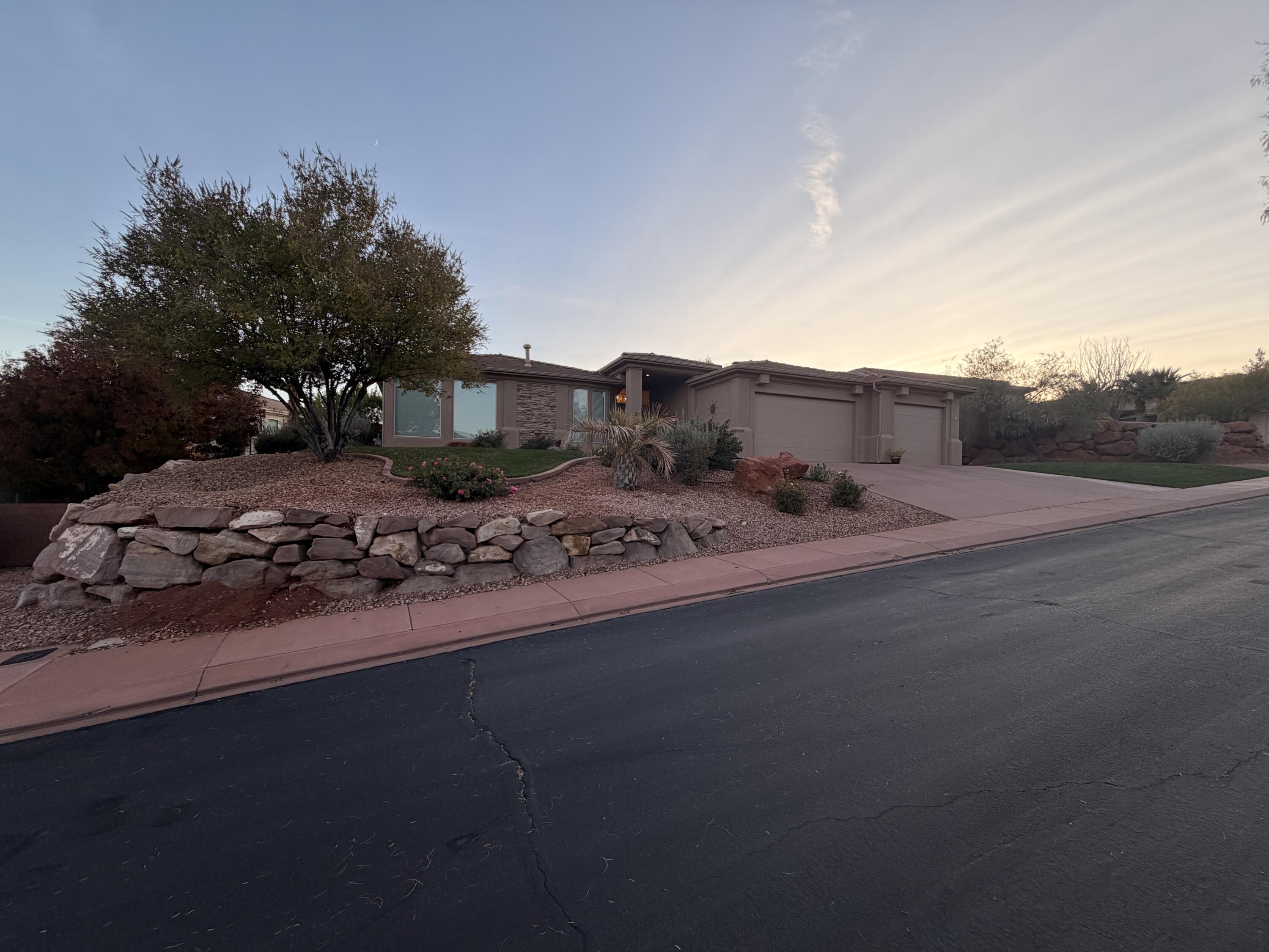 New on the market! 3 bedroom 2 bath with stunning red- rock views, roomy primary suite and attached 3 car garage. Low- maintenance yard and near trails and shopping. You wont want to miss this! Call agent for showing today.