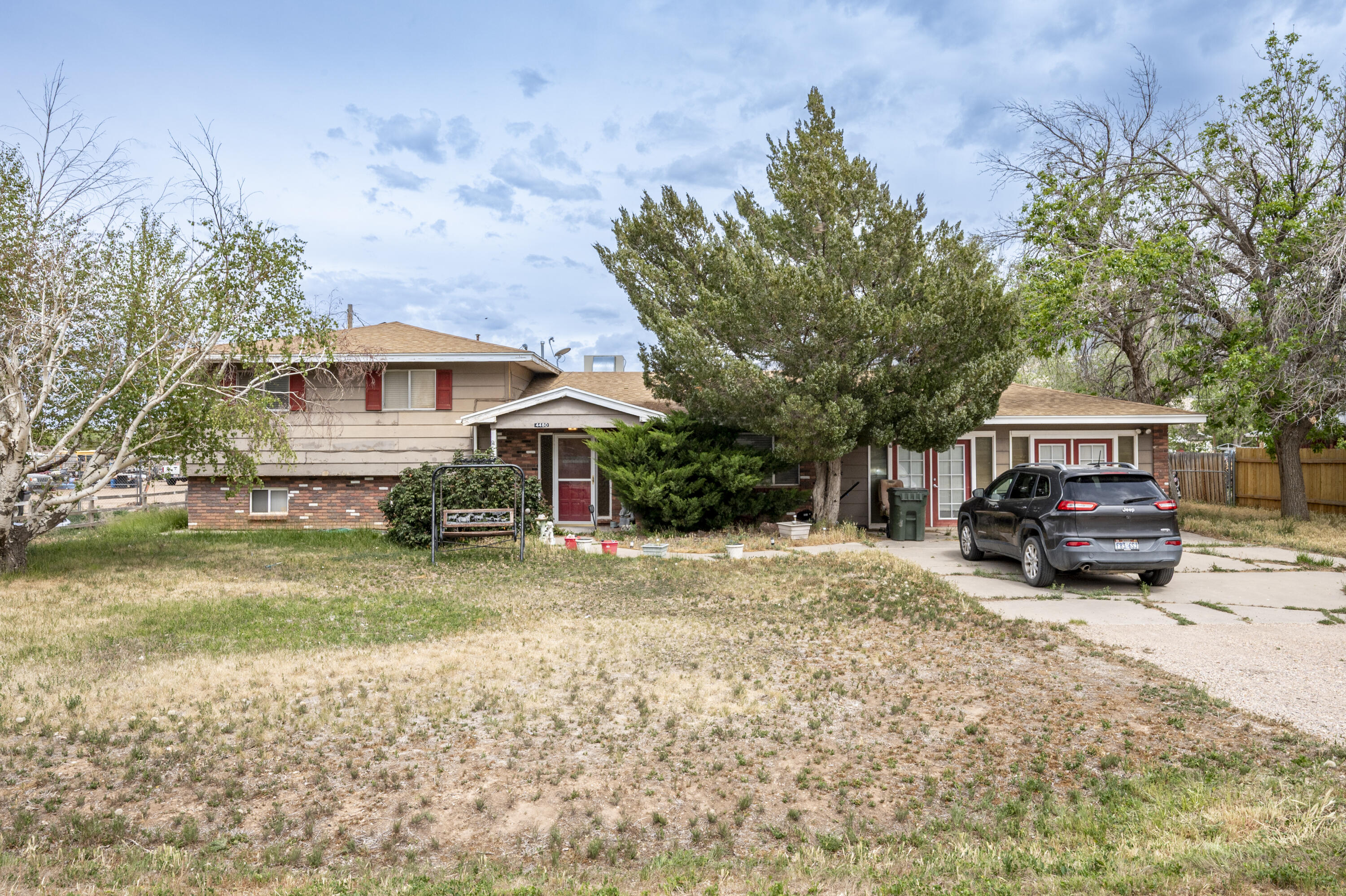 Located in a desirable area of Enoch, this spacious 4 bed, 4 bath home sits on a half-acre lot with plenty of room inside and out. The property features a massive 1,740 sq ft detached garage/workshop, perfect for hobbies, storage, projects, toys, or additional workspace. Inside, you'll find a functional layout with generous living spaces and room for entertaining or everyday living. The large lot provides space to enjoy the outdoors while still offering the convenience of nearby amenities. This property is a great combination of comfort, space, and versatility with endless possibilities!