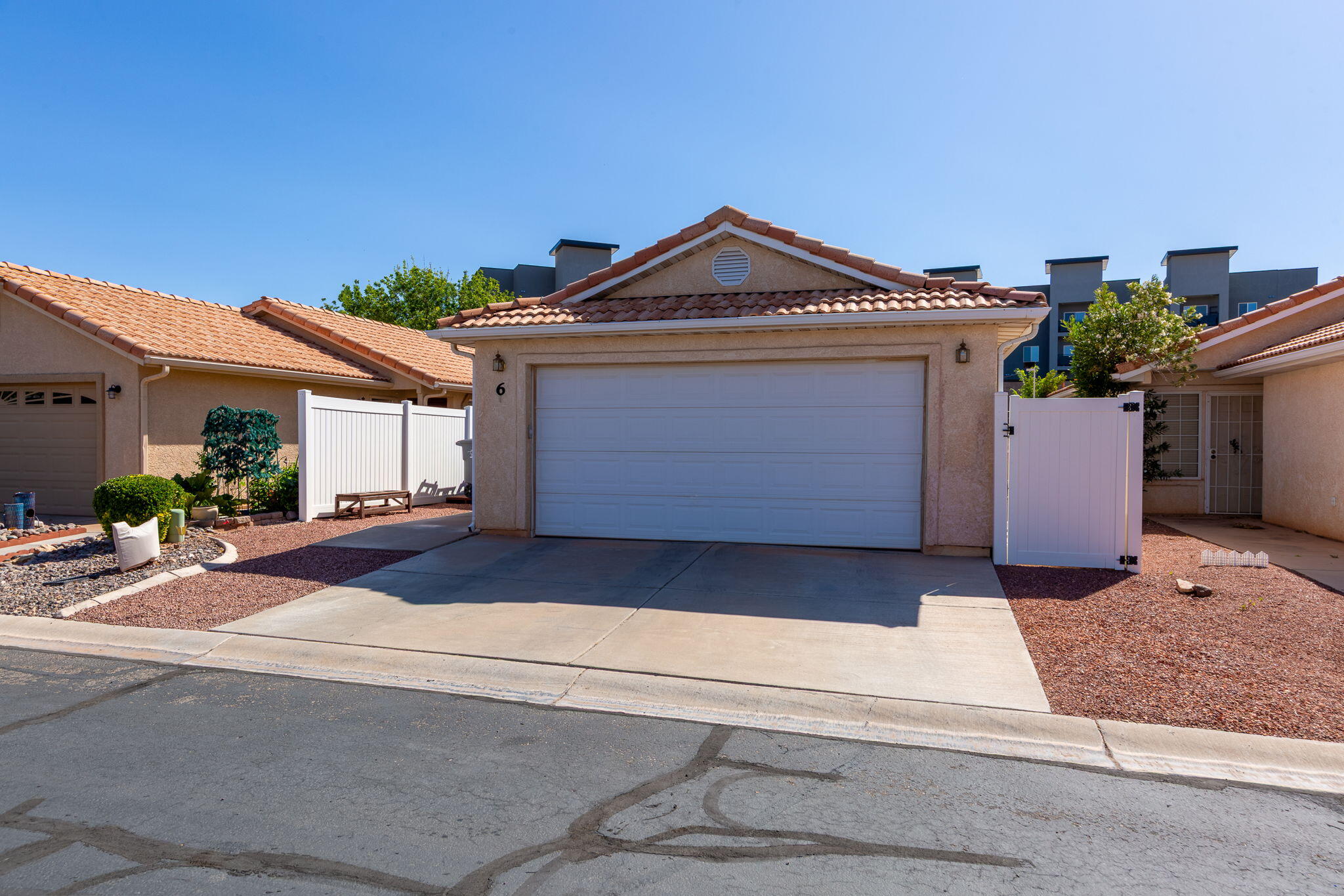 Step into comfort, convenience and well-maintained community with this charming spacious 2-bedroom, 2 bath home located in a 55+ neighborhood with low HOA and great amenities. Features included newer flooring and paint, newer cabinets, new water system, new faucets throughout and kitchen sink, new light fixtures, over-sized backyard patio with full patio cover, sunscreen, extra-large shed, Trex-patio flooring, xeriscape landscaping and more. The brilliant colors invite a homely feel yet classy look throughout. The primary suite provides a peaceful retreat with ample closet space while guest room is ready to welcome visitors or serve as a cozy hobby space. Conveniently located to shopping, restaurants, freeway, rec center, trails and bus line. Low HOA fees of $108 a month include private road, common area maintenance, indoor pool, exercising room, and loads of activities.