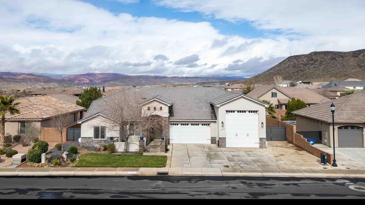 Welcome to this stunning single-level home in the highly sought-after Dixie Springs community, just minutes from Sand Hollow Resort. Situated on a quiet street, this immaculate property offers four bedrooms plus a full casita--perfect for guests, multi-generational living, or rental income. The expansive primary suite features a spa-like bath with a soaking tub inside the oversized shower and generous his-and-hers walk-in closets. The open-concept living area creates an inviting flow with exceptional space and comfort. Outside, enjoy a fully fenced yard, hot tub, extra-large garage with RV bay, and additional RV parking. A gorgeous home designed for both relaxation and adventure.
