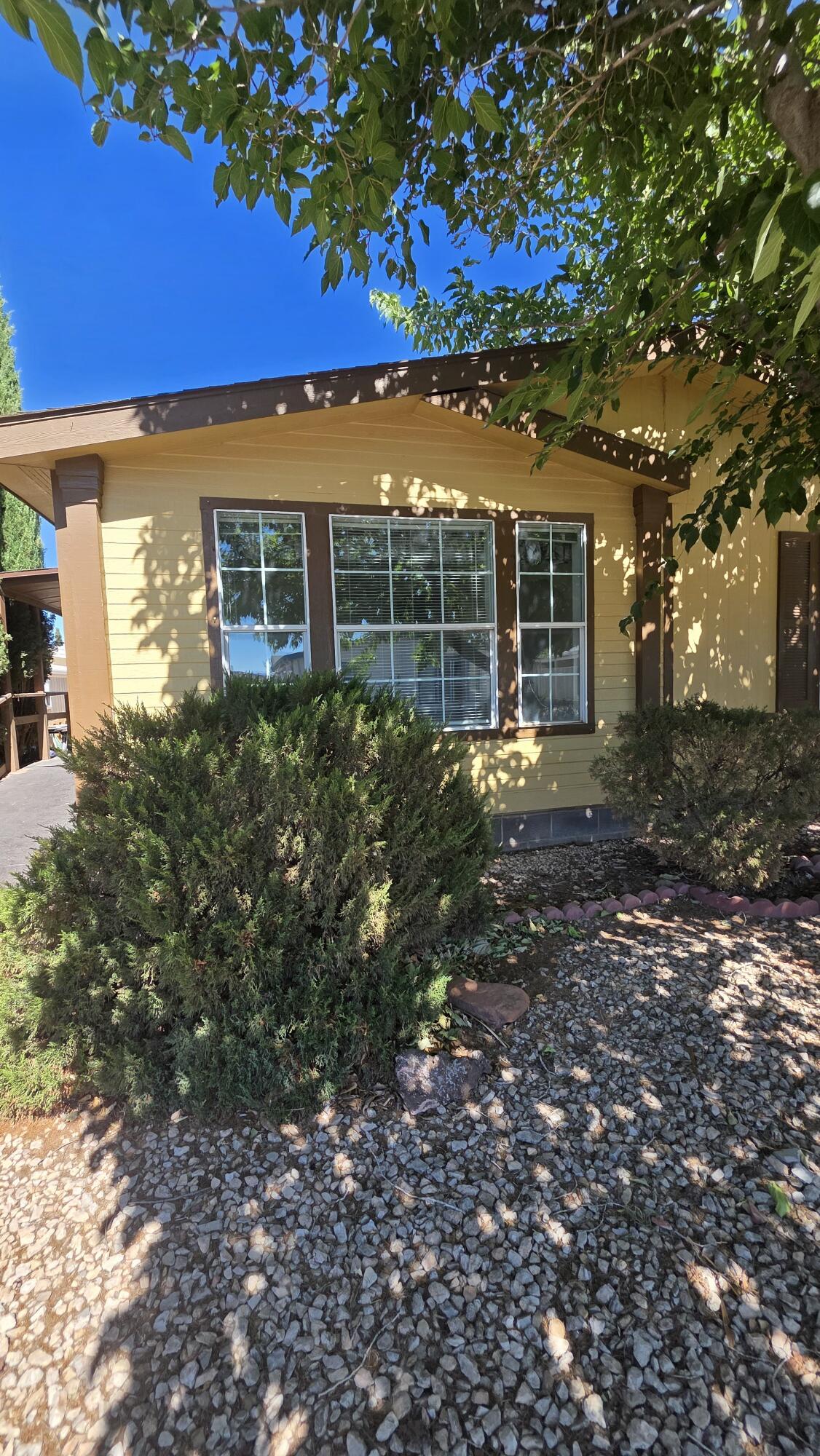 Welcome home to this charming and well-maintained 2-bedroom, 2-bath home located in a desirable Lava Bluff 55+ community! Featuring brand-new carpet and flooring throughout, this home offers a fresh, inviting feel with a spacious and functional layout. Clean, comfortable, and move-in ready, you'll appreciate the generous living spaces and low-maintenance lifestyle. Whether you're looking to downsize or enjoy the amenities of active adult living, this adorable home is the perfect fit. Don't miss your chance to make it your next home!