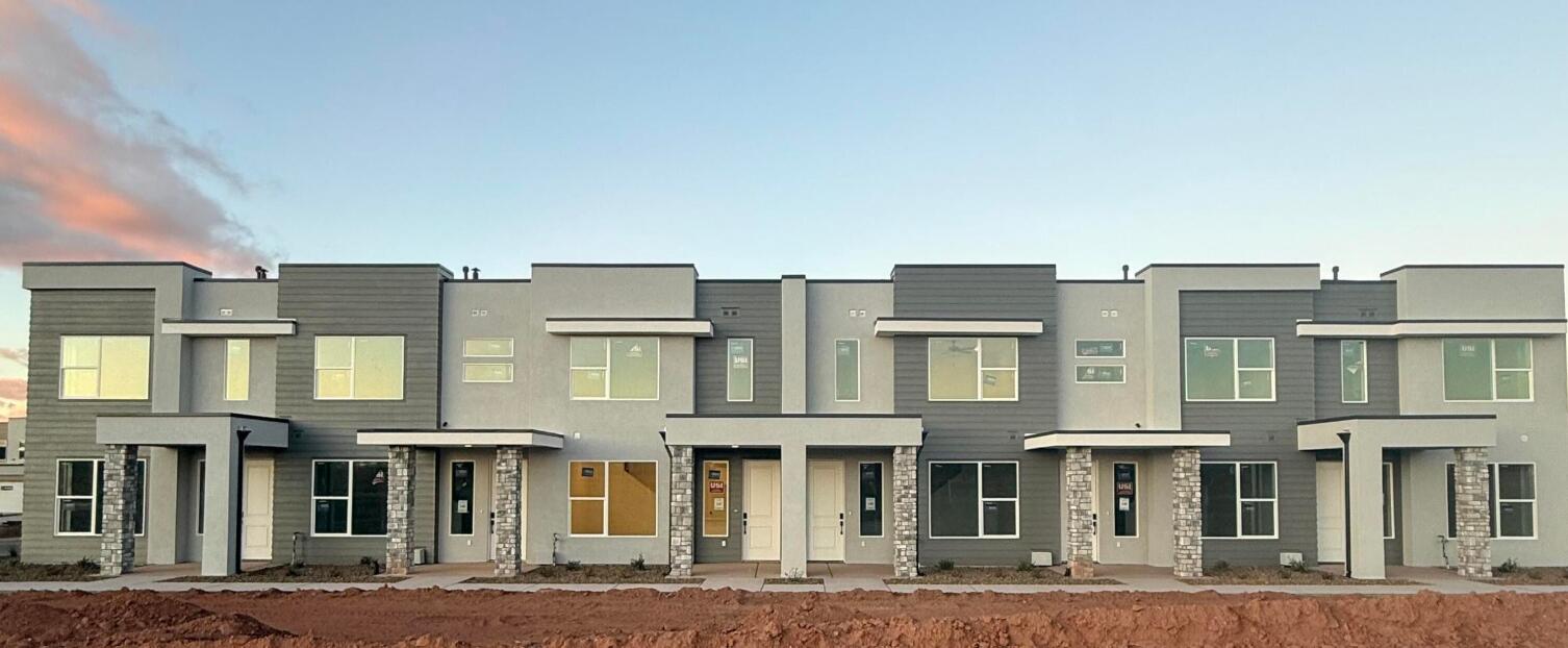 This inviting 3 bedroom, 2.5 bathroom townhome boasts a prime location just moments away from Zion Shores surf park, Warner Valley, and Sand Hollow making it perfect for outdoor enthusiasts and adventure seekers. The spacious living area flows seamlessly into a well-appointed kitchen complete with stainless steel appliances. The generous primary bedroom is complete with an en-suite and walk in closet. Two additional bedrooms provide plenty of space for guests, a home office, or hobbies and they share a stylishly designed full bathroom. A convenient half-bath is located on the main level. Step outside where you can enjoy views of Warner Valley and Pine Valley.