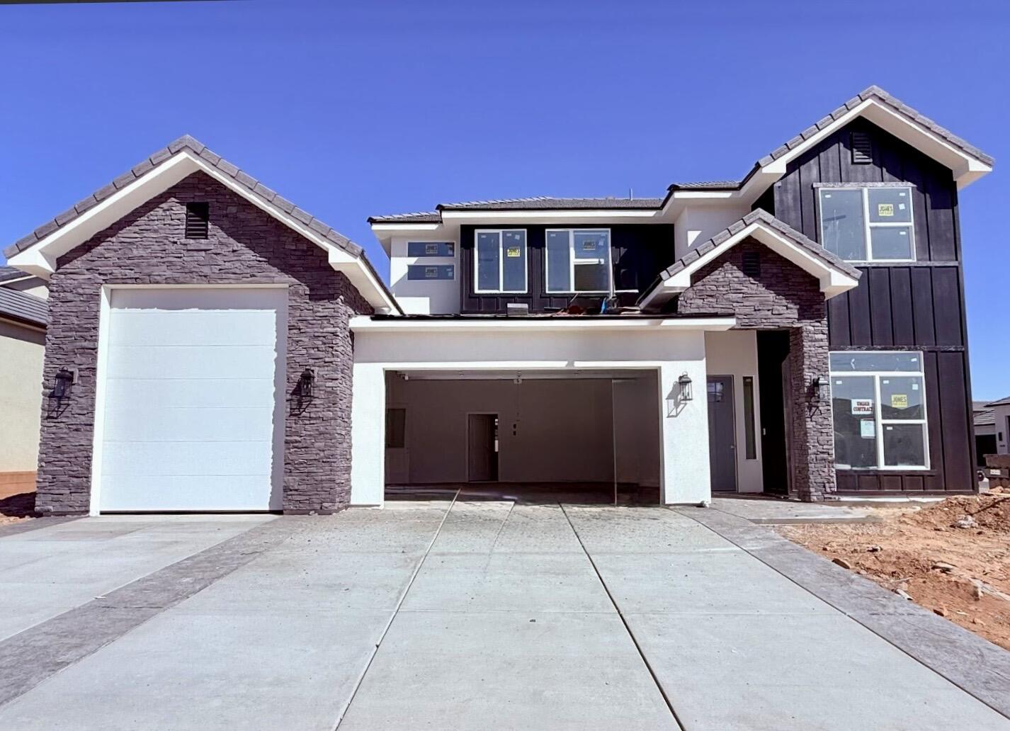 S&S Homes at Riverbend! Beautiful finishes thourghout, boat garage, front and backyard landscaping included.