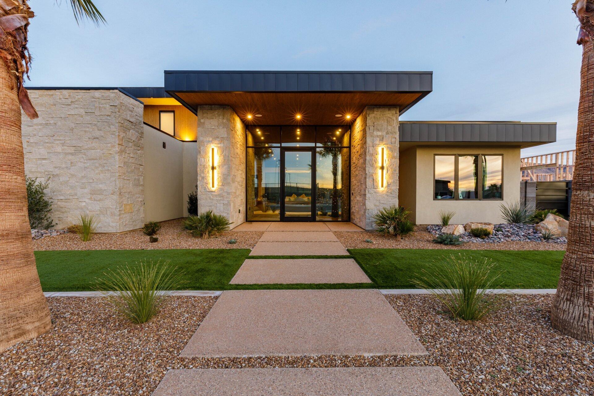 Experience the pinnacle of outdoor leisure where desert sunsets meet lake life. This property blends resort-worthy design with a complete water-sports playground, crafted for entertaining, family fun, and year-round activities.  Featuring 13' ceilings, rich sandstone, walnut and granite finishes, and premium Wolf appliances.  Thoughtfully designed by Megan Rae Interiors with indoor and outdoor spaces seamlessly integrated to maximize everyday living and entertaining.   An Infinity Edge Pool: 2 pickle ball courts, your own boat house with 2 stalls and a large entertaining deck upstairs. The RV Garage providing ample storage and workspace for toys, trailers, and more.  All furnishings, Tv's and A/V system included in the sale.  Three Lakes in the Community with dedicated spaces for every water sport: The Boat Lake: accommodates two boats simultaneously for wakeboarding or waterskiing, the Surf Lake is equipped with a surf machine for endless wave rides, and the Cable Lake: features obstacles and is cable-driven for action-packed sessions....A Lifestyle you'll love! Wakeboard, water-ski, surf, to your heart's content all in your backyard! This is more than a home; it's a lifestyle. If you're a water-sports enthusiast seeking a resort-like retreat with serious activity options, this is the one. Schedule a private tour to see how every day can feel like a vacation. Agent is related to seller.