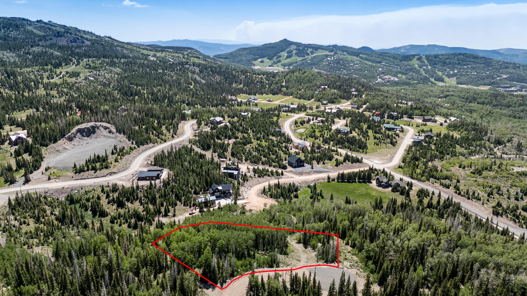Discover the perfect opportunity to build your dream mountain retreat in the heart of Brian Head's sought-after Steam Engine Meadows subdivision. This spacious 1.78-acre lot is nestled among tall pines and surrounded by sweeping views of the Parowan Valley and nearby mountains, this property provides a serene backdrop for both winter adventures and summer escapes. Included in the sale are custom architectural plans for a 3,286 sq. ft. log-style home designed for luxurious mountain living. Click on Virtual Tour Button to see rendering flyover. Price would be reduced without the plans. CONTACT AGENT FOR FULL SET OF PLANS. The thoughtfully planned layout features two master bedrooms, a game room, and a Crow's Nest. All utilities available to this lot - fiber, sewer, water, gas and power.

The design also allows for kitchens on both levels, ideal for hosting guests or multi-generational living. An impressive 2,314 sq. ft. of garages includes space for an RV, all your gear, and multiple vehicles. This lot offers year-round access and has all utilities available, making it a ready-to-build opportunity for those looking to escape to the mountains without sacrificing convenience. Whether you're planning to enjoy it as a full-time residence, vacation getaway, or investment property, this lot offers unmatched potential in one of Utah's premier mountain towns. Don't miss this unique opportunity to own a prime piece of land in Brian Head, Utah's all-season playground for skiing, snowboarding, hiking, biking, and more. FLY AROUND VIEW OF CABIN RENDERING AVAILABLE UNDER PHOTO TAB THEN VIDEO LINK ON TOP.