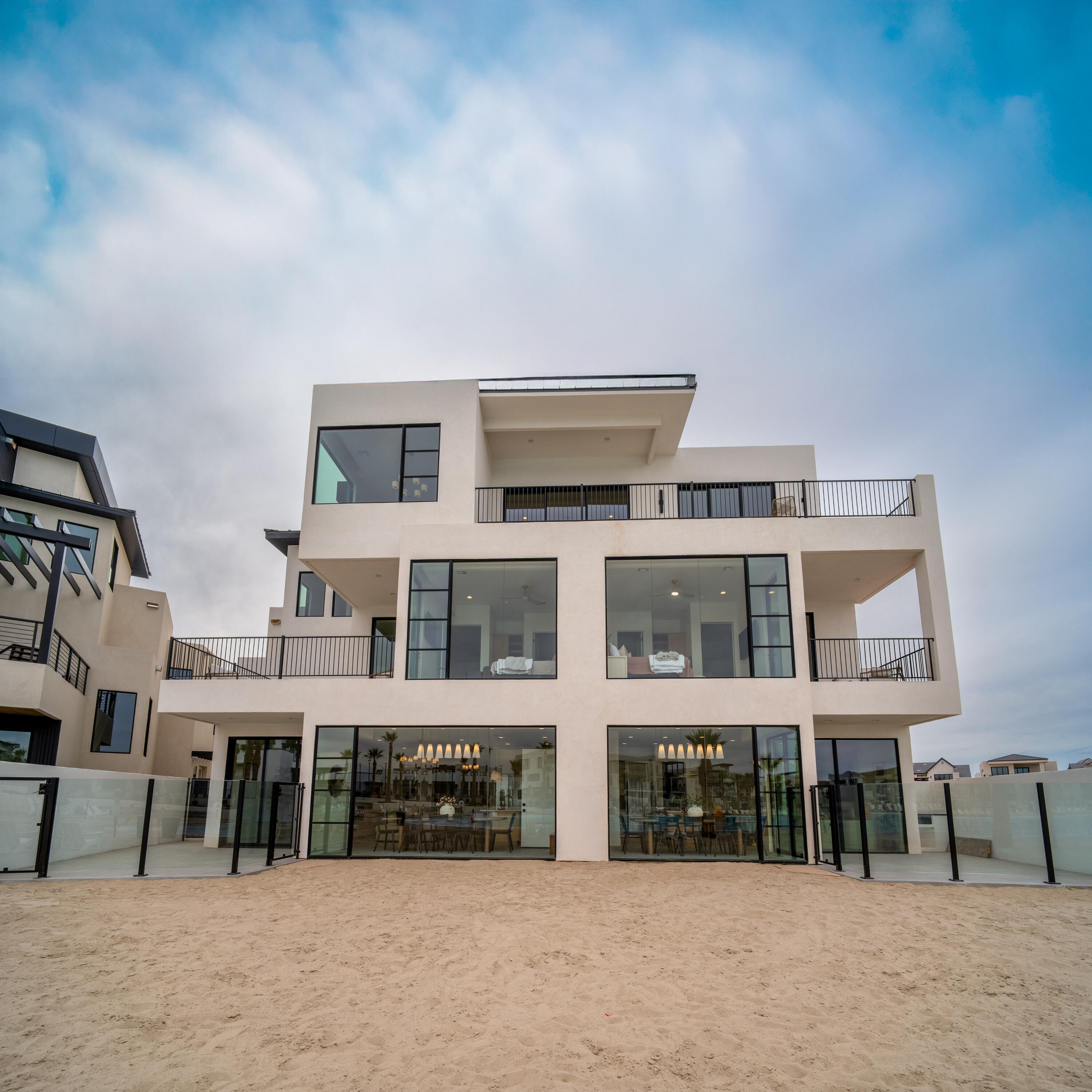 This rare lagoon-front property offers true resort living in Southern Utah. Positioned directly on the white-sand lagoon, this home is nightly rental approved and uniquely designed with three single units all combined, With three separate kitchens and five different living spaces  — ideal for maximizing income, hosting large groups, or creating flexible owner use.

Desert Color is centered around a 2.5-acre lagoon with sandy beaches, swimming, paddleboarding, and resort-style amenities including pools, hot tubs, trails, and pickleball. Conveniently located with quick access to I-15, downtown St. George, and the region's world-class outdoor recreation.

Own a waterfront asset in one of St. George's most in-demand vacation communities.