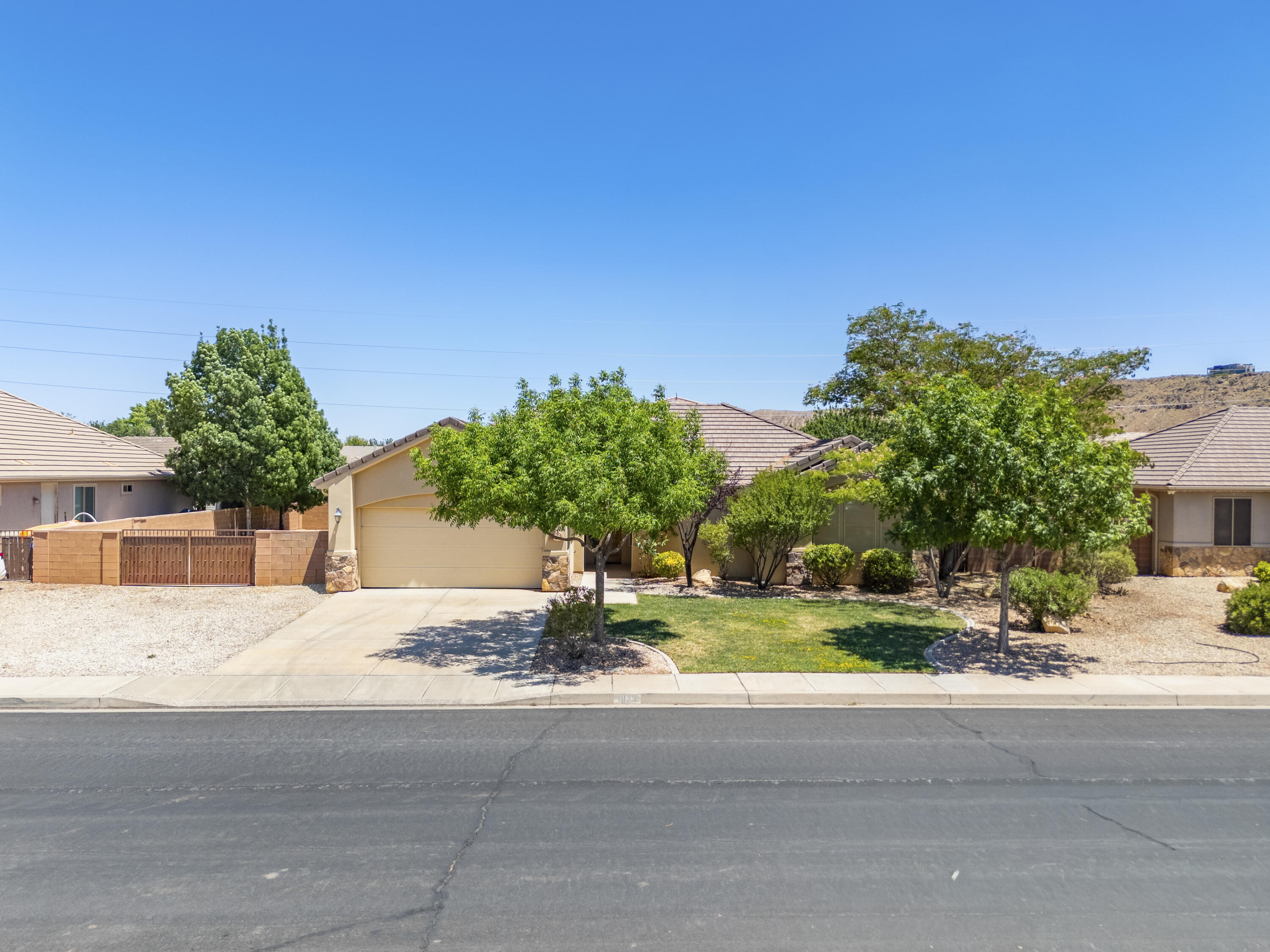 Don't miss this Washington Fields home in the highly desirable Stonecreek Meadows neighborhood! With a large open floor plan that's perfect for everyday living and entertaining, this home offers spacious bedrooms, beautiful hardwood floors, and a fully fenced backyard with plenty of room to enjoy. Conveniently located just minutes from top-rated schools, parks, shopping, and everything Washington Fields has to offer.