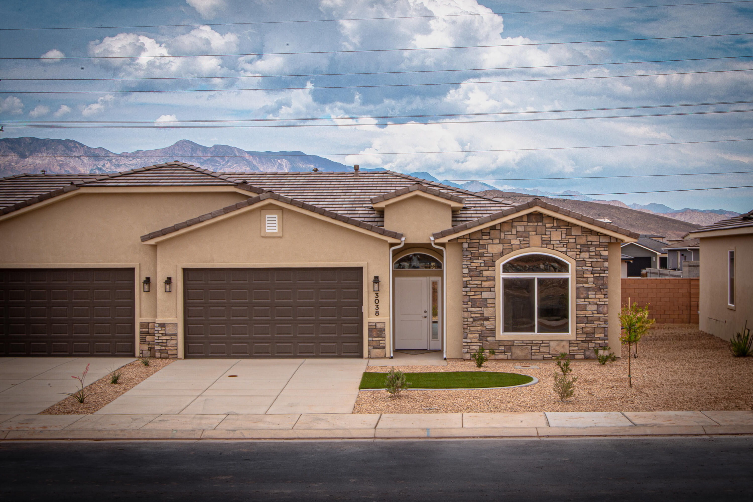 Now offering $10,000 in builder incentives to use toward closing costs, rate buy downs or extras! Brand new single-story townhome with forever views of the Pine Valley Mountains from the spacious North-facing backyard with a generous awning and patio is now finished and ready for move-in! Centrally location in Hurricane just minutes to the hospital, schools, Walmart, golf, bike path and a lifetime's worth of outdoor recreation! The floor plan has been upgraded with the addition of a large hardwood pantry and the master shower floor is recessed for increased accessibility. The flooring may look like wood, but its actually super scratch resistant porcelain tiles that will still be like new in 20 years! The cabinets are real hardwood in a timeless style - no particle board. Community has RV/trailer parking for residents at no monthly fee! Leaseback program available for investors.