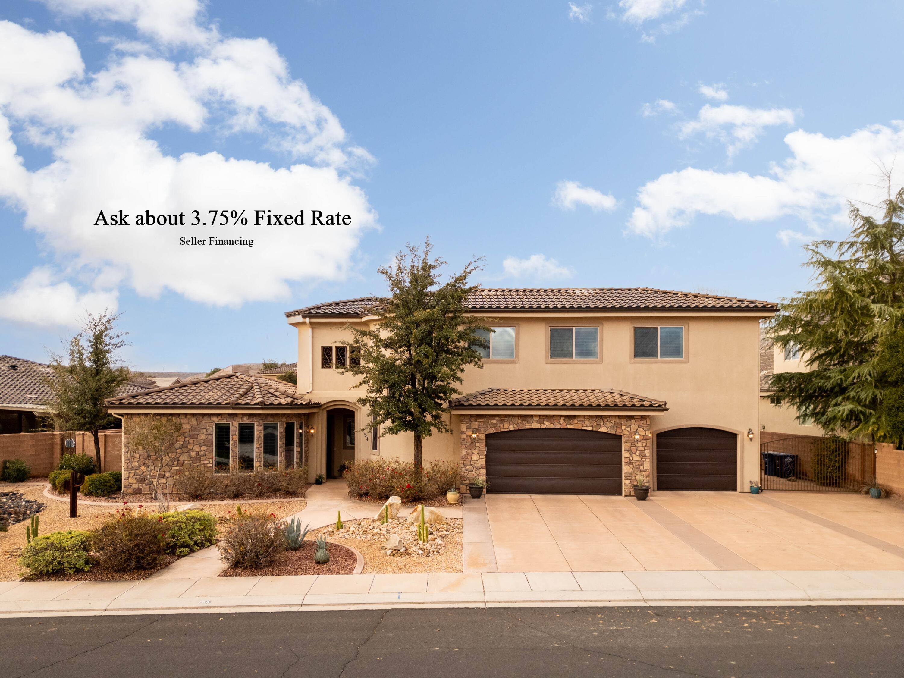 Ask about our 3.75% Fixed rate.  Located in a quiet circle in Santa Clara with NO HOA, this beautiful southwest style home is full of wonderful features.  New carpet, 10' ceilings and oversized crown mouldings give this home a true luxury feel.  The kitchen is well equipped with all custom cherry cabinetry and a grand center island for all to gather around.  The oversized pantry is concealed by a hidden door and contains a secret staircase which leads up to an amazing bonus loft.  The bonus loft with it's own half bath sits above the 3 car garage and offers endless possibilities for flex space.  This area can also be accessed by an amazingly crafted spiral staircase which showcases the front of the home.  The primary suite is oversized and contains a double sided fireplace and it's own private den.  Soak in your jetted tub or enjoy the double spray walk in shower.  The closet has his and her wings with ample space, a makeup counter and built in organization.  Lastly, dual sinks and plenty of storage.  
A private pool adorns the side patio and the indoor/outdoor cabana bar is perfect for those days where everybody is over to cool off in your oasis.  The pool has been newly tiled and plastered in a rich blue and has its own sandstone diving rock.  Other pool area features include a fully retractable cover, pool heater, outdoor shower, and outdoor access to a half bath making this area simple and easy to enjoy.  Behind the home down a private lane is a bonus 2 car shop with its own half bath. Owner / Agent