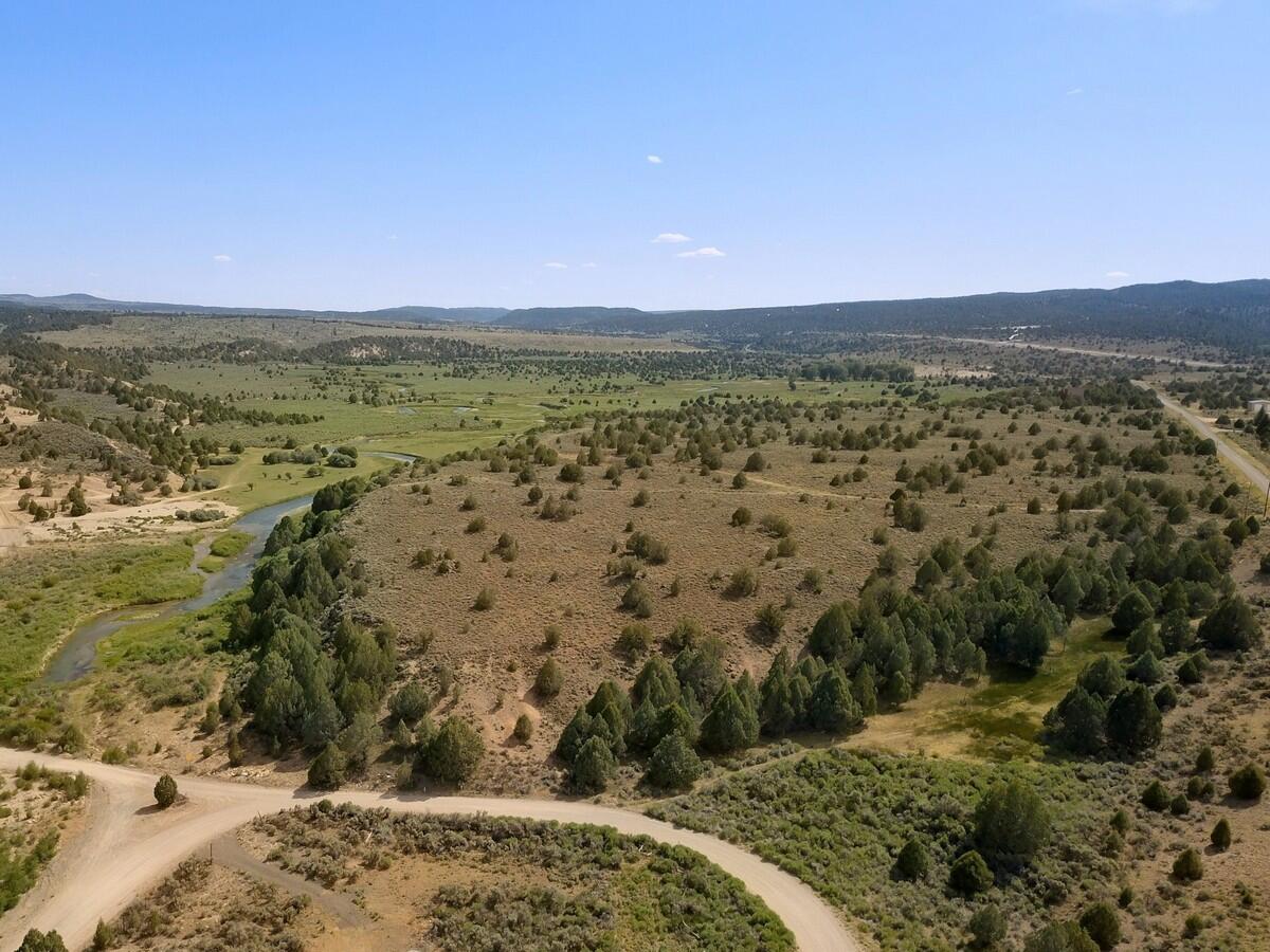 29.15 Acres with the Sevier River running through it. Conveniently located on the east side of Old US 89, approx 1 mile south of the little town of Hatch. The property has views of the pink cliffs of Red Canyon which is the entrance to Bryce Canyon and these views are illuminated when the sun sets in the afternoons. The property is wooded with juniper trees and features a large level area overlooking the Sevier River that would make a great home or cabin site.  Power is in the area and the property comes with 1/2 AF water rights that can be used to drill a personal well. The property is animal friendly and is large enough for small farm/ranch. Southern Utah has easy access to many national sites including Bryce Canyon, Grand Canyon, Zion National Park, Cedar Breaks National Monument and is mins away from the Dixie National Forest. Call today for more information.