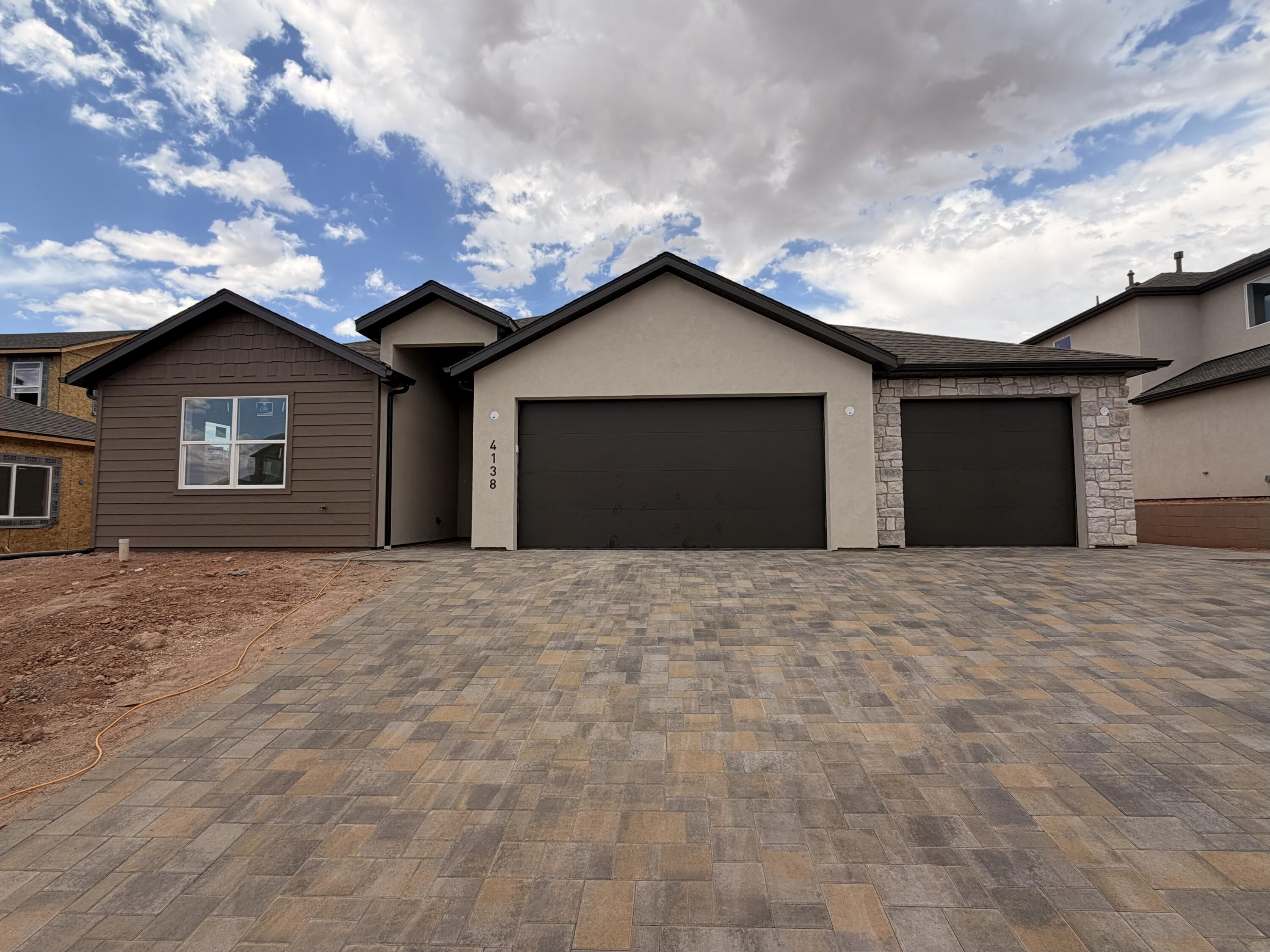 This thoughtfully designed single-story home offers 1,710 square feet of comfortable living space under roof, complemented by a spacious three-car garage. the open-concept layout blends the living, dining, and kitchen areas seamlessly, creating a welcoming environment for both daily living and entertaining. The kitchen features a generous pantry and flows into the dining space, while the adjoining living room is perfect for family gatherings. A private master suite includes a walk-in closet and a well-appointed master bath, providing a relaxing retreat. Two additional bedroom share a full bath, making this home ideal for families or guests.
