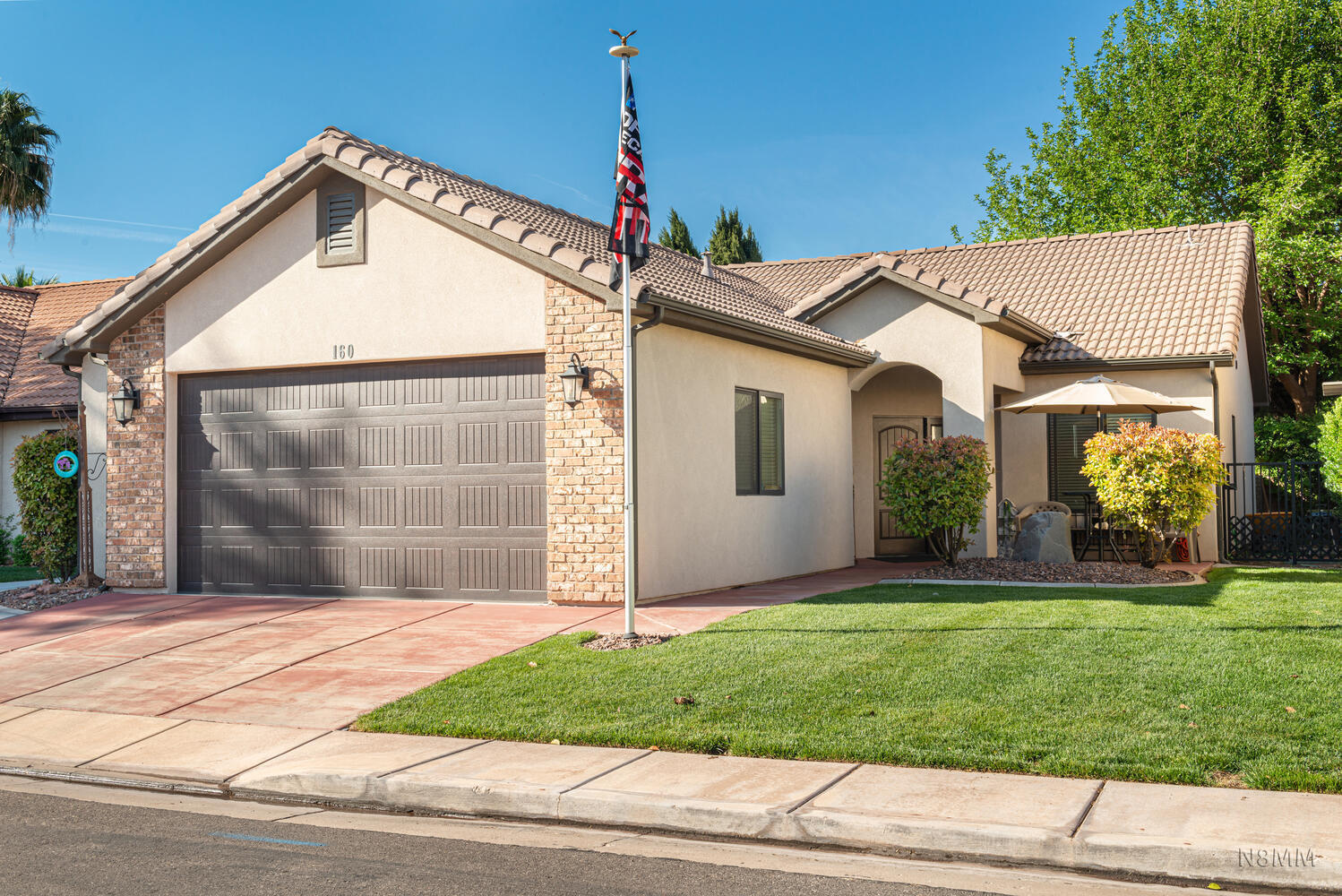 Welcome to your new, private paradise! Located in the well-established Park at Green Valley, enjoy pickleball, tennis, and basketball courts just around the corner, along with exercise equipment, an outdoor pool, playground equipment, a large lawn and more. This home is adjacent to a rushing waterfall from the massive estate at the end of your road, so you can relax to the natural sounds of flowing water and enjoy the lush greenery along your private road. Whole-yard landscaping takes care of the front yard and blows the back and side yard, which have been newly refinished with brick pavers (allowing for a great outdoor entertainment space or more storage). Garage interior has a side area for a tool bench/extra storage along with a dedicated storage room. Built in 2014, this home stands apart from the rest of the community as the newest home in the subdivision. Other upgrades include 10-foot ceilings, solid wood doors, granite throughout, tiled showers, upgraded toilets, completely stucco exterior (no wood eaves) and sturdy, water resistant hardwood floors. Come see for yourself what sets this amazing home apart!