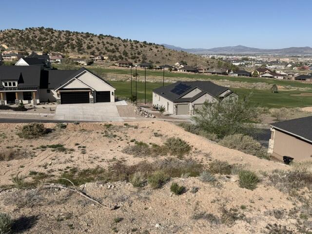 Wonderful building lot in highly sought after Canyon Ridge Subdivision.  Build your dream home today overlooking the beautiful golf course and enjoy those relaxing sunsets.  This vacant lot includes water, sewer and power.  There are not many lots left in this beautiful subdivision!  Buyer and Buyer's agent to verify all information.  No appointment needed.