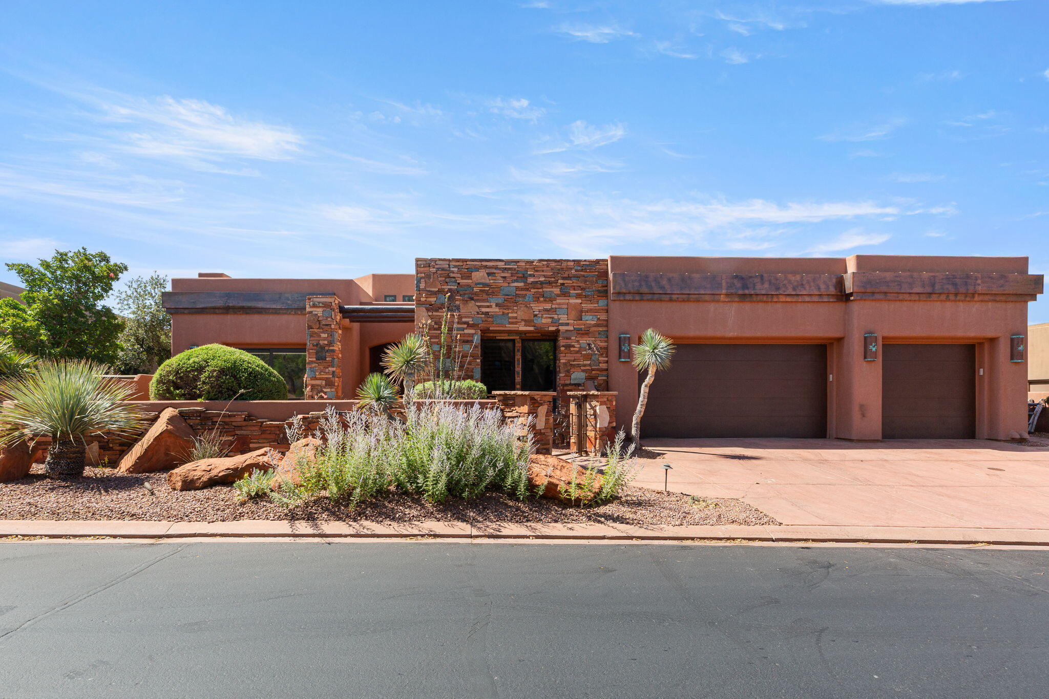 This amazing home was just completely repainted inside with new lights being ordered for the great room, kitchen, dining, most bathrooms and entry hall.  Don't miss this fabulous price for a 4 bdrm, 4 bath home with an office or sitting area. The backyard of the home is a private oasis with wonderful views of the Entrada golf course holes, Kachina Cliffs and more.  With a water feature, built-in BBQ, Hot tub and more you have an amazing backyard to enjoy the peace, the stars and the sunrises.  The kitchen, great room and dining are all open and spacious for entertaining and visiting friends and family.  All the bedrooms are open and spacious and the home has 3 fireplaces. This home is a must see for anyone wanting to live in the Cliffs and then join the Entrada Country Club if you wish.  the Cliffs has it's own clubhouse with a wonderful pool and jacuzzi plus a tennis court.  Inside the clubhouse is a workout/gym area plus areas to hang out and play games or cards.  
 The HOA dues cover the private roads, the front landscaping, the gates and the HOA pool and Jacuzzi, tennis court gym and welcome area. You can purchase a Social Membership to the Entrada Country Club for a one time fee of $15,000 with a monthly fee of $243 which gives you full access to the Entrada Clubhouse and to the Entrada Private Gym/Wellness Center which includes tennis courts, pickelball courts, full weight room, outdoor pool, basketball court, volleyball & 4-6 classes per day (yoga, Pilates, zumba, Pilates Reformer, etc). The Sports/Wellness Center is open 7 days a week 6am - 8pm. Also comes with an $800 food min per year (about $66 per month) for use at Entrada Social events, snack bar, grille & restaurant. Live the Amazing Entrada Lifestyle! Have instant new friends with many events going on at the Country Club weekly. There are group hikes, bike rides, skiing, Tuachan, bridge, mahjong, knitting and book clubs, etc.