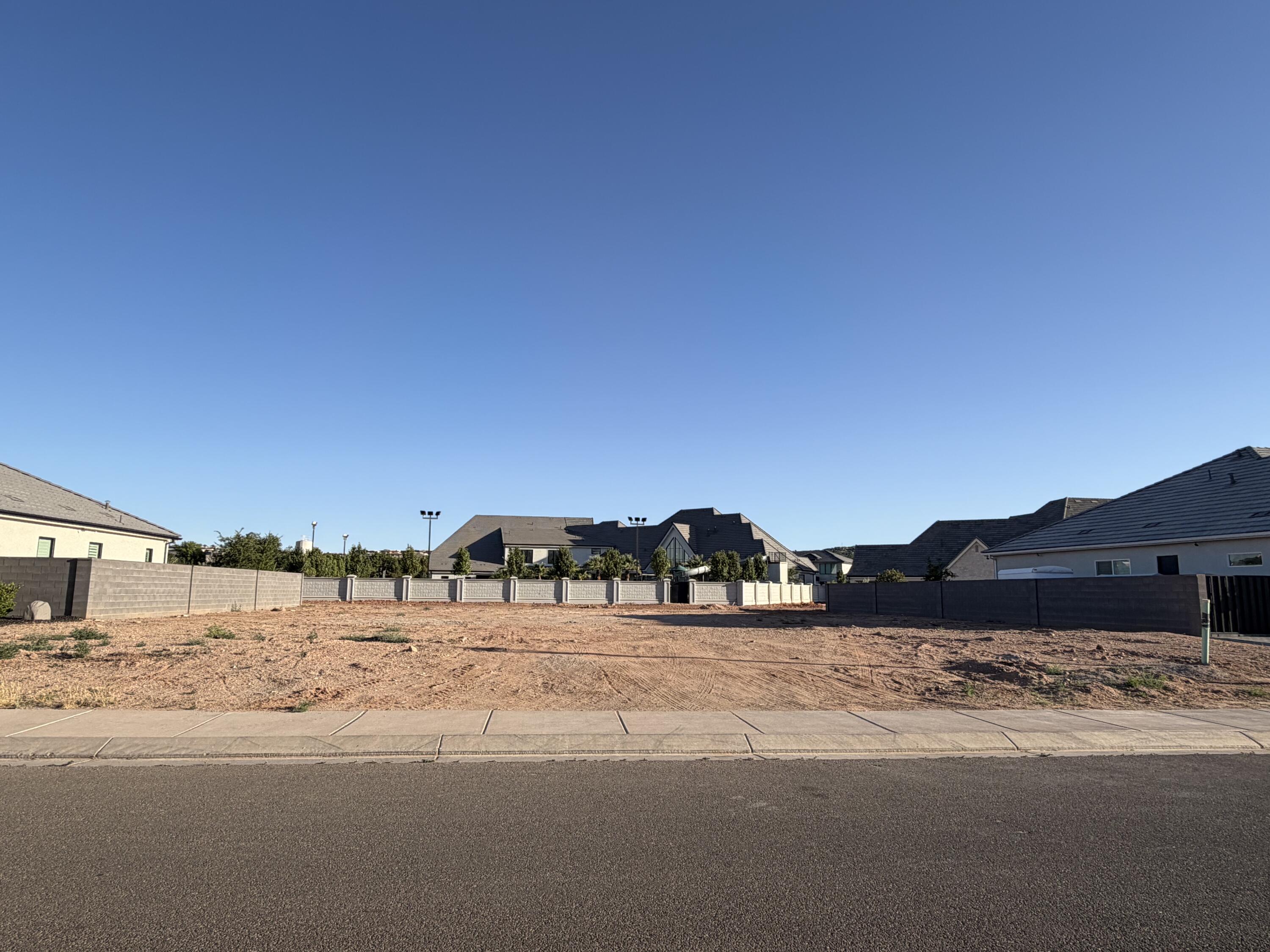 Moorland Park Lot 60 of Phase 3
Build your dream home in the highly desirable Moorland Park community. This 0.27-acre homesite is surrounded by beautiful custom estates and offers scenic views of the Pine Valley Mountains, with a tranquil pond located just down the street.
One of the few remaining available lots in the area, this property is ideally situated near Washington City's new Pasea shopping and entertainment district. Enjoy convenient access to dining, shopping, and entertainment including a movie theater; all within walking distance.
With its prime location, upscale surroundings, and welcoming neighborhood atmosphere, Lot 60 offers a rare opportunity to build in one of Washington's most sought-after communities.
Lot has an easement behind giving more space from the neighbors.
All utilities are available at the lot.
Washington County water conservation fee has been paid ($12k value).
Buyer agrees to verify all information.
Lot Size: 0.27 Acres
Location: Moorland Park Phase 3, Lot 60