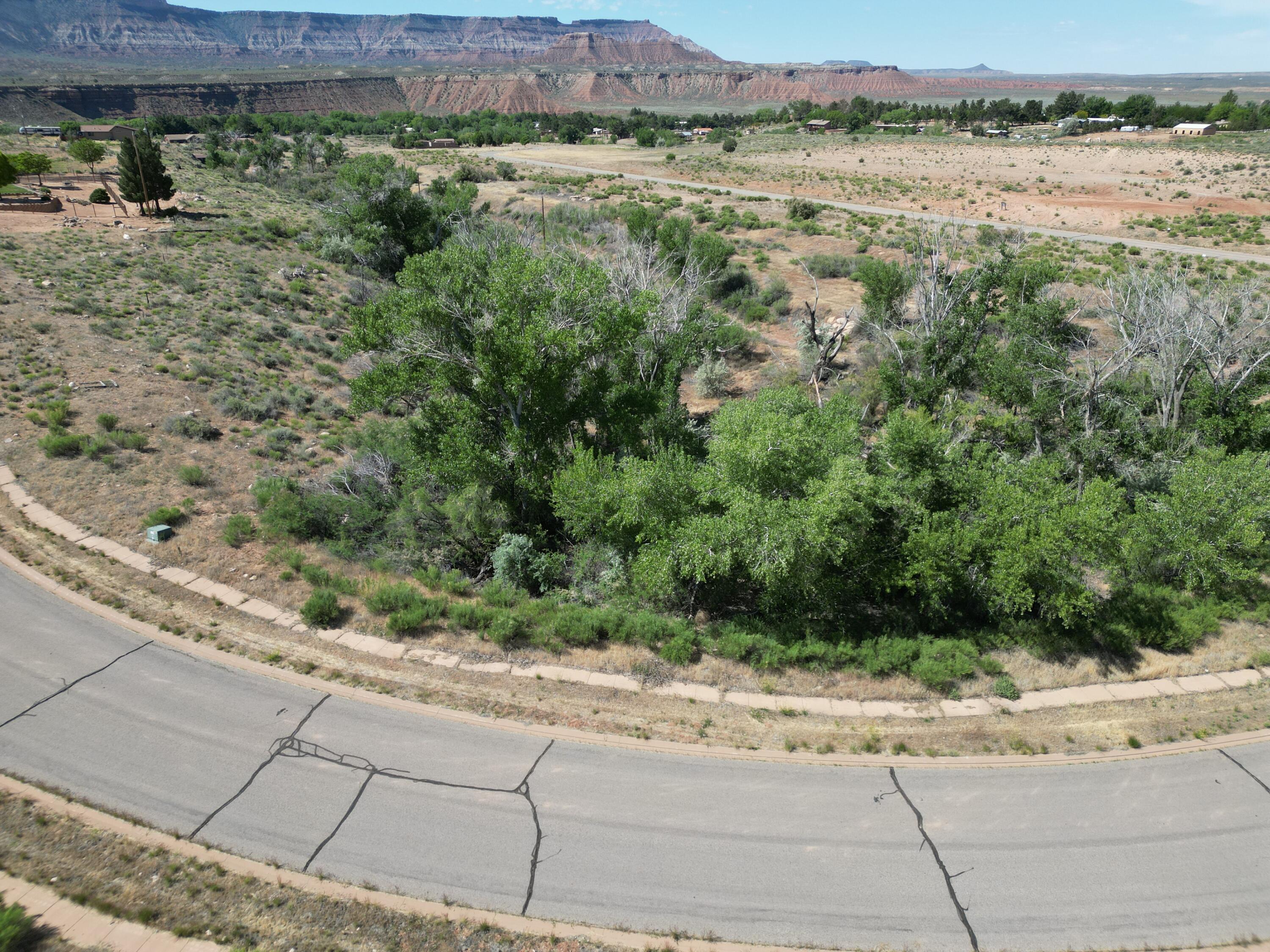 New Release - Phase 2 Premium 1+ Acre Lots Now Available!

Welcome to Sierra Bella in Virgin, Utah, where luxury rural living meets the breathtaking beauty of Southern Utah. Visit our brand-new sales office and discover an exceptional opportunity to own a fully improved estate-sized homesite just minutes from the entrance of Zion National Park.

These premium 1+ acre homesites offer spectacular panoramic views of Zion's iconic red rock mesas and provide the perfect setting for your custom dream home.

Each Homesite Includes:

One share of pressurized irrigation water
Culinary water connection
Fully improved lot
Washington County Water Conservancy impact fees already paid

Prices Starting at $305,000

Sierra Bella offers a rare combination of privacy, natural beauty, and modern conveniences in one of Southern Utah's most desirable communities.

It is Nestled in the heart of the Zion Canyon region at approximately 3,600 feet in elevation, Virgin is renowned for its stunning landscapes, dark night skies, and unmatched access to outdoor recreation. Residents enjoy nearby hiking, biking, ATV trails, horseback riding, and endless opportunities to explore Southern Utah's spectacular scenery.

The area is known for:

Sweeping views of Zion National Park and surrounding mesas
Ranch properties and rich agricultural heritage
Dark skies perfect for stargazing
World-class outdoor recreation
A peaceful rural lifestyle with convenient access to modern amenities

The surrounding landscape has served as the backdrop for numerous films, commercials, and outdoor recreation productions, showcasing the area's extraordinary natural beauty.

This location is one of Southern Utah's most scenic gateway communities while preserving its historic charm, rural character, and welcoming atmosphere.

Don't miss this limited opportunity to secure your place in Southern Utah paradise.

All information deemed reliable but not guaranteed. Buyer is responsible for independently verifying all informati