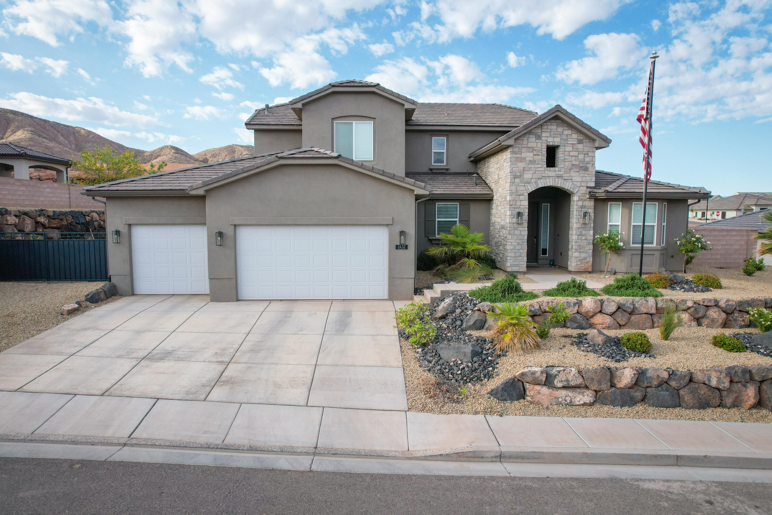 Beautiful 2023-built 5-bed, 4-bath home in Shooting Star Phase 2. This 3,190 sq ft residence on a .24-acre lot offers a versatile 1.5-story floor plan with modern comforts and ample space for comfortable living in sunny Washington, UT