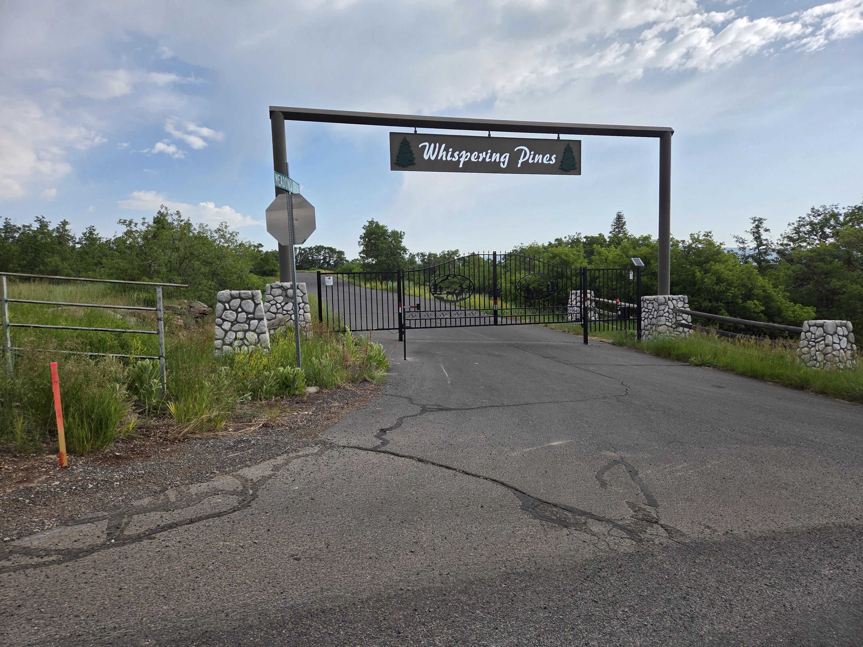 WHISPERING PINES SUB - Land