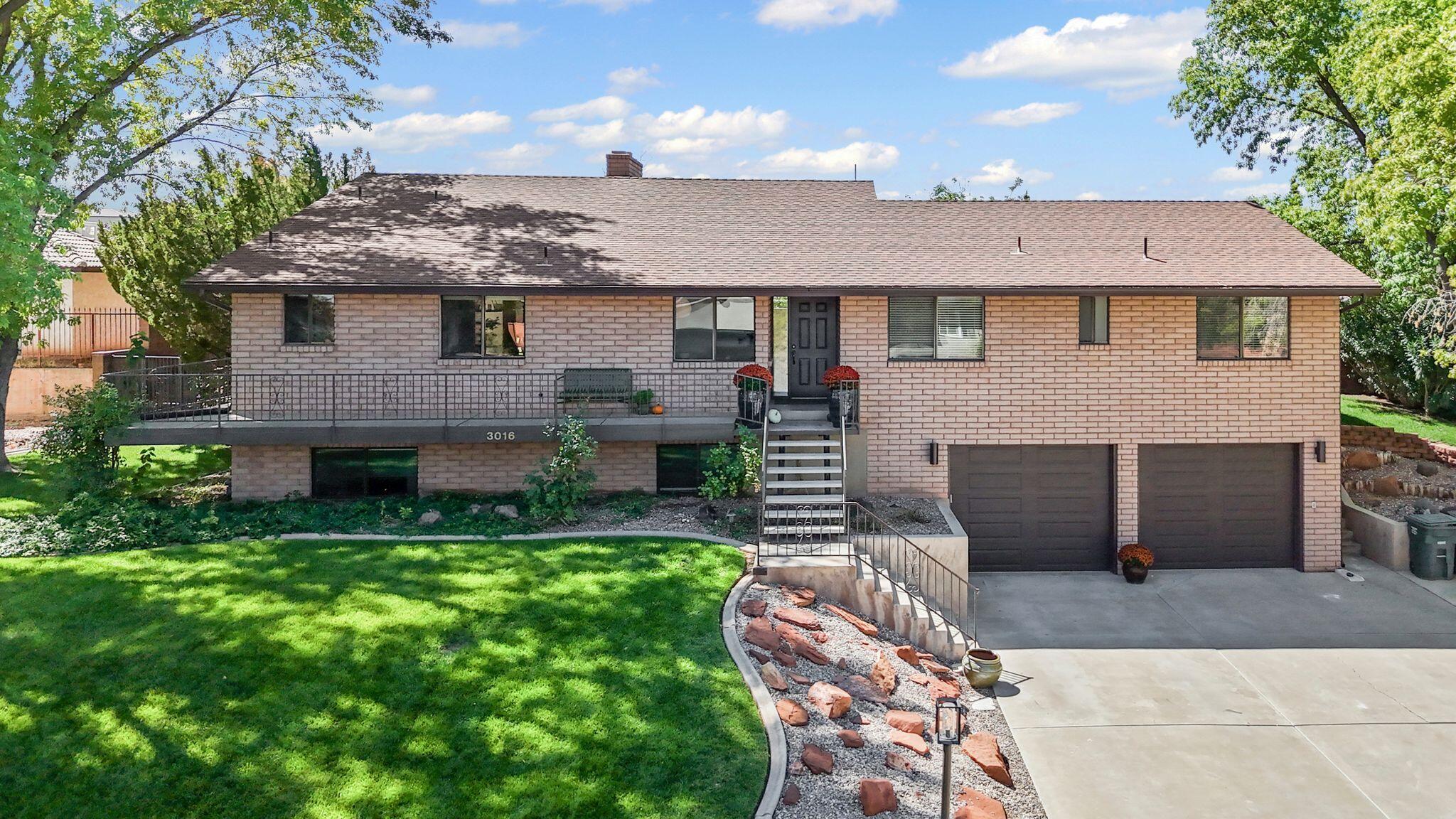 Don't miss this one! Timeless charm meets modern updates in this one-owner custom home nestled on a quiet street near the St. George Golf Course. Built in 1983, this classic, well-crafted residence offers 5 bedrooms, 3.5 baths, and 2 spacious family rooms -perfect for both everyday living and entertaining. Recent improvements include new flooring, carpet, and paint throughout, updated lighting, countertops, and a beautifully remodeled primary bathroom. Enjoy the warmth of three fireplaces, a wrap-around porch, mature shade trees, and abundant storage throughout. With its solid construction, thoughtful updates, and unbeatable location, this home is ready to welcome its next chapter.