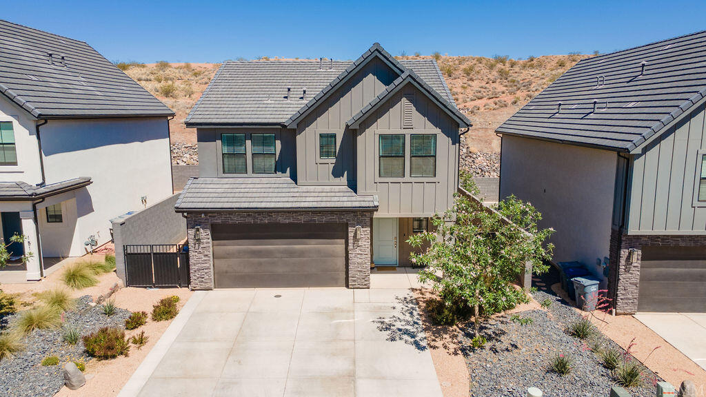 Thoughtfully upgraded and impeccably maintained, this home offers the perfect blend of warmth, functionality, and modern finishes throughout. Features include custom cabinetry in the kitchen and half bath, oversized kitchen island, upgraded flooring and trim, fans in every room, tankless water heater, water softener, reverse osmosis system, and exceptional storage throughout. Unlike new construction, the backyard is already fully finished with artificial turf, side-yard storage, and a storage shed. The garage has also been upgraded with a mini split system for year-round comfort. Clean, functional, and truly move-in ready!
Enjoy resort-style living with access to a heated pool, hot tub, pickleball courts, basketball court, parks, playgrounds, and open green spaces. Conveniently located near Sand Hollow Reservoir, hiking and biking trails, golf courses, Southern Parkway, and everything Southern Utah has to offer.
Buyer and agent to verify all information.