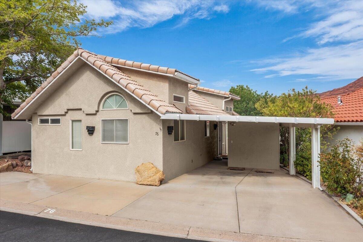 Perched on an elevated lot with breathtaking views of the red cliffs, this inviting 2-bedroom, 2-bathroom stick built home offers comfort, charm, and an exceptional connection to Southern Utah's natural beauty. Vaulted ceilings, skylights, and abundant natural light create a bright, airy atmosphere, while the cozy layout makes you feel right at home.

The expansive covered deck is the heart of the home--perfect for gathering with family and friends, dining outdoors, or simply relaxing as you take in the stunning red rock views. Whether you're enjoying a quiet morning coffee or an evening sunset, this outdoor living space is designed to be enjoyed year-round.

Located in an established community with mature trees and peaceful streets, residents enjoy access to a clubhouse, outdoor pool, hot tub, and neighborhood parks, creating the perfect balance of relaxation and recreation.

Adventure is just minutes away. Quail Lake is only a 3-minute drive, offering sandy beaches, paddleboard and kayak rentals, boating, fishing, and endless opportunities to enjoy the water. Just beyond your doorstep, the Red Cliffs National Conservation Area provides more than 130 miles of designated hiking, mountain biking, and equestrian trails, where spectacular desert landscapes and peaceful solitude await.

Whether you're looking for a full-time residence, a weekend escape, or a place to embrace an active outdoor lifestyle, this home offers the ideal combination of comfort, community, and unforgettable scenery.