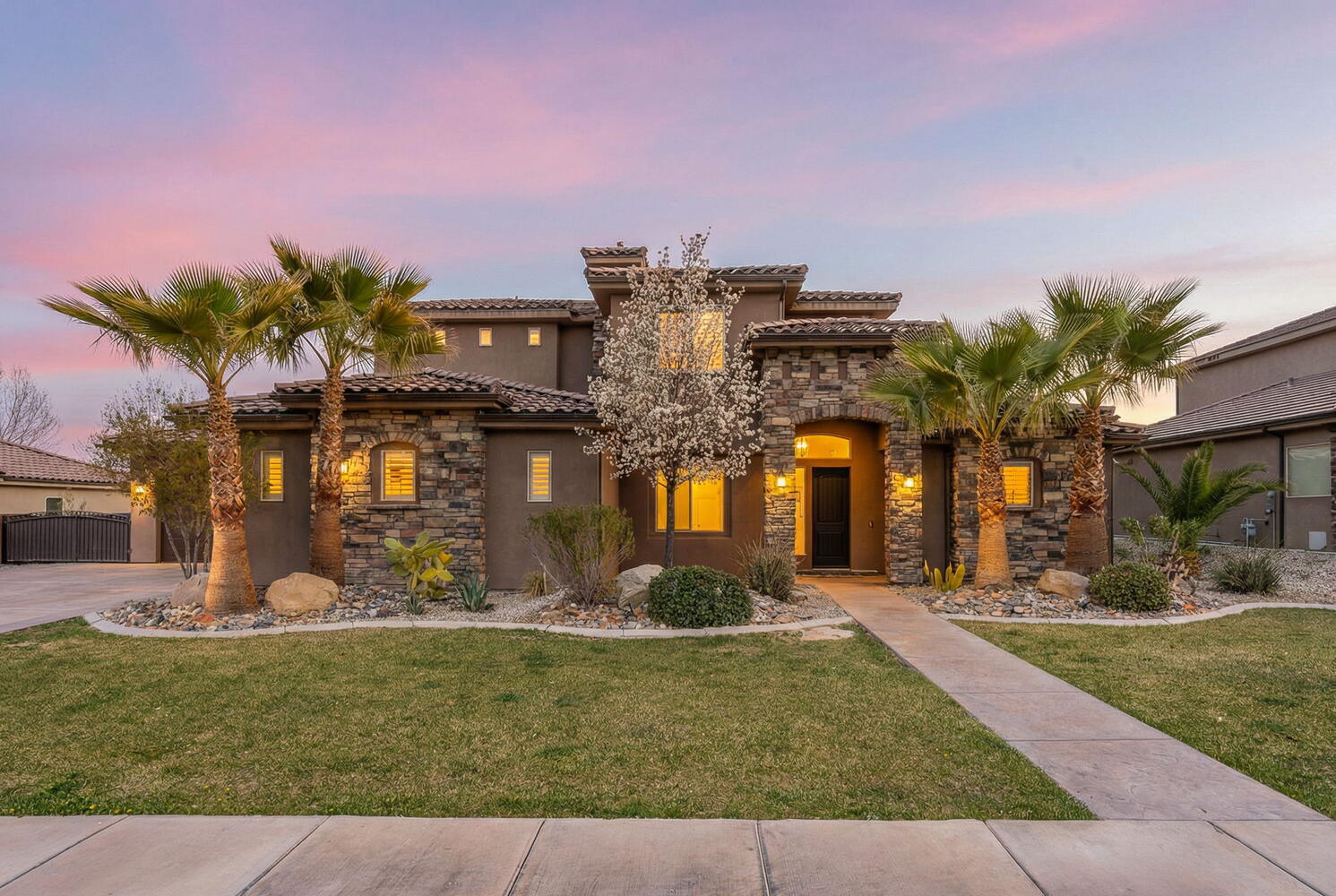 Casita w/ kitchenette! 6 bedrooms! No HOA! Living & Family room! 12' natural stone kitchen island, natural stone coutertops, custom wainscoting, coffered ceilings, designer lighting, and multiple ensuite bed/bath combos. The open-concept layout connects the gourmet kitchen and living area seamlessly. A 2nd spacious family room provides flexible living & entertaining space. 1000+ sf garage is plenty big for recreational vehicles. Ideally convenient to nearby parks, schools, shopping in the sought-after Sycamore neighborhood.