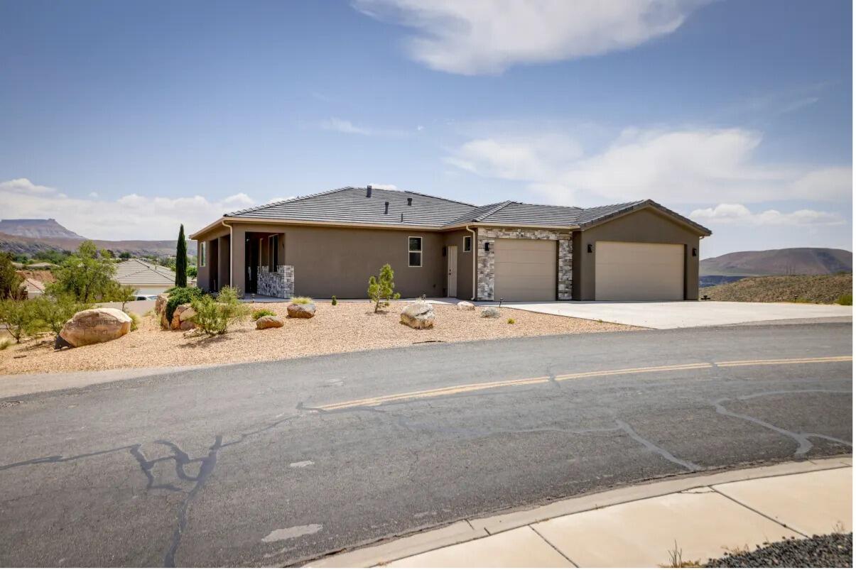 Move in ready 5 bedroom and 3.5 bath home! Located in a great location in Toquerville, less than 30 minutes to Zions National Park. You can purchase this home as your primary home or purchase it as a turn key short term rental which attracts many guests wanting to be close to Zions Gateway. The furniture may be included in the sale. It has the potential to be 3 SEPARATE Units. It has 3 kitchens, 4 bathrooms, a master suite, 3 sets of washer and dryers, 2 car garage, 12 ft ceilings, Bosch appliances. 1/2 acre lot with lots of parking including trailers. It has amazing views! Buyer to verify all information.