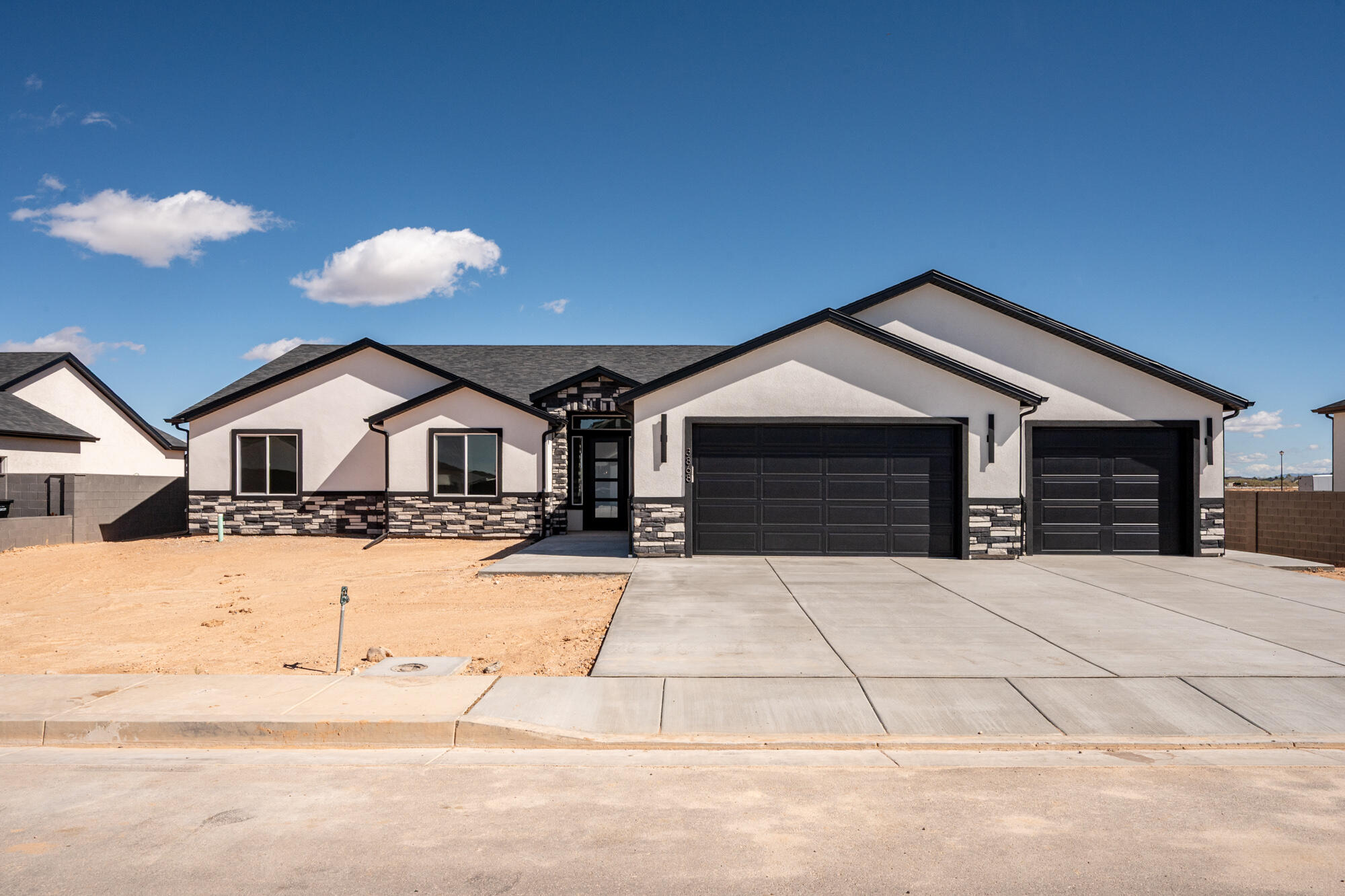 Discover the perfect blend of modern luxury and thoughtful design in this new construction single-level home, offering 2,532 sqft of living space and 3 car garage. With 4 large bedrooms and 2.5 bathrooms, this home sits on a generous .33-acre lot that will be fully fenced with a block wall! The heart of the home is the gourmet kitchen with custom cabinets, tile backsplash, micro hood, huge walk-in working pantry, and a massive island complete with a stylish farmhouse sink. A tray ceiling adds elegance while the generous dining area flows out to a large covered patio-ideal for indoor-outdoor entertaining. The beamed living room features a fireplace accented with shiplap and brick flanked by built-in bookshelves and cabinets. The huge primary bedroom features a tiled shower and soaker tub!