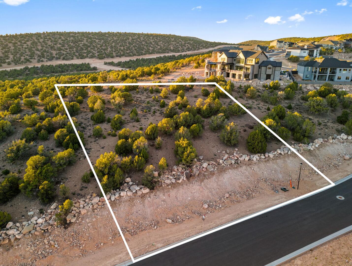This is Lot Number 21, a 1.31-acre homesite located in the highly sought-after Estates at South Mountain subdivision. Enjoy stunning views of Shurtz Canyon and the surrounding Southern Utah mountains. This growing community is positioned near planned future elementary, middle, and high schools, adding long-term value and convenience. Bring your own builder or choose to build with the South Mountain Development Group. Don't miss this opportunity to secure a premium lot in one of Cedar City's most desirable neighborhoods. No HOA.
