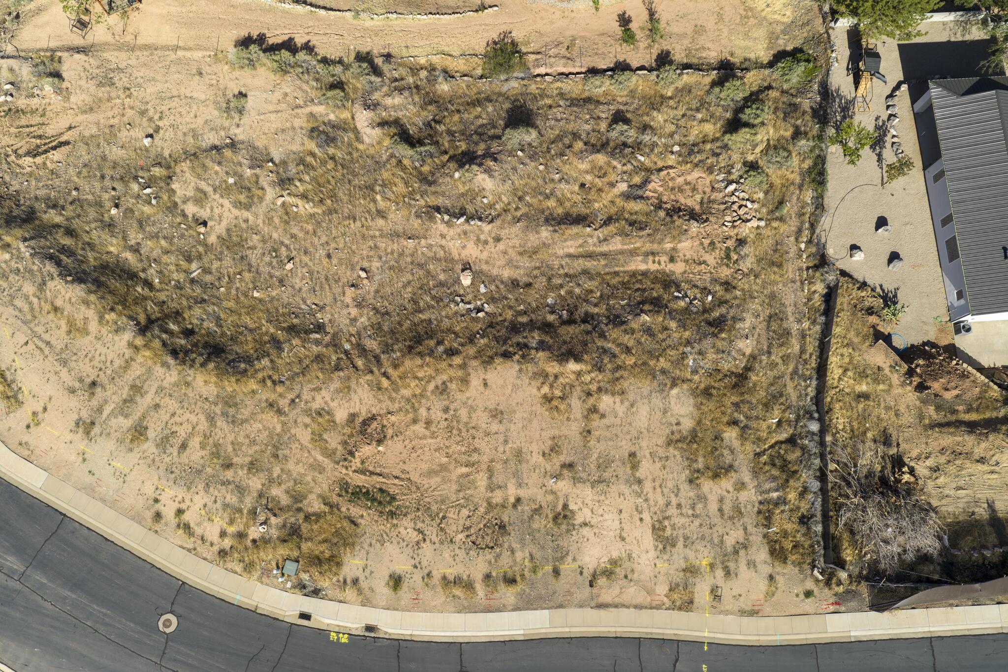 Large .44 acre lot, conveniently located in La Verkin just minutes from Zion National Park. Offering walk-out basement potential, this affordable building lot provides the perfect opportunity to build in Southern Utah without the burden of HOA fees. Tucked into a relaxed neighborhood, you will enjoy sweeping views of the valley and surrounding red rock mesas without paying premium resort prices.