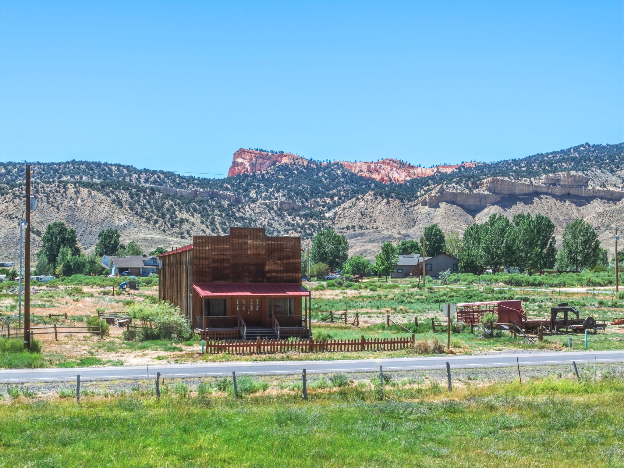 There are soooooo many possibilities with this home/building and accompanying acreage!  The building is 864 sf and was built in 1985.  The lot is 2 acres and is zoned commercial.  Previously a sandwich shop, it could be revived as a small retail store, with room to grow or for storage / supplies / equipment.  It's close to Bryce Canyon National Park where everything is so scenic and beautiful!  Don't miss out on this great opportunity to own this property in wonderful Tropic, Utah!