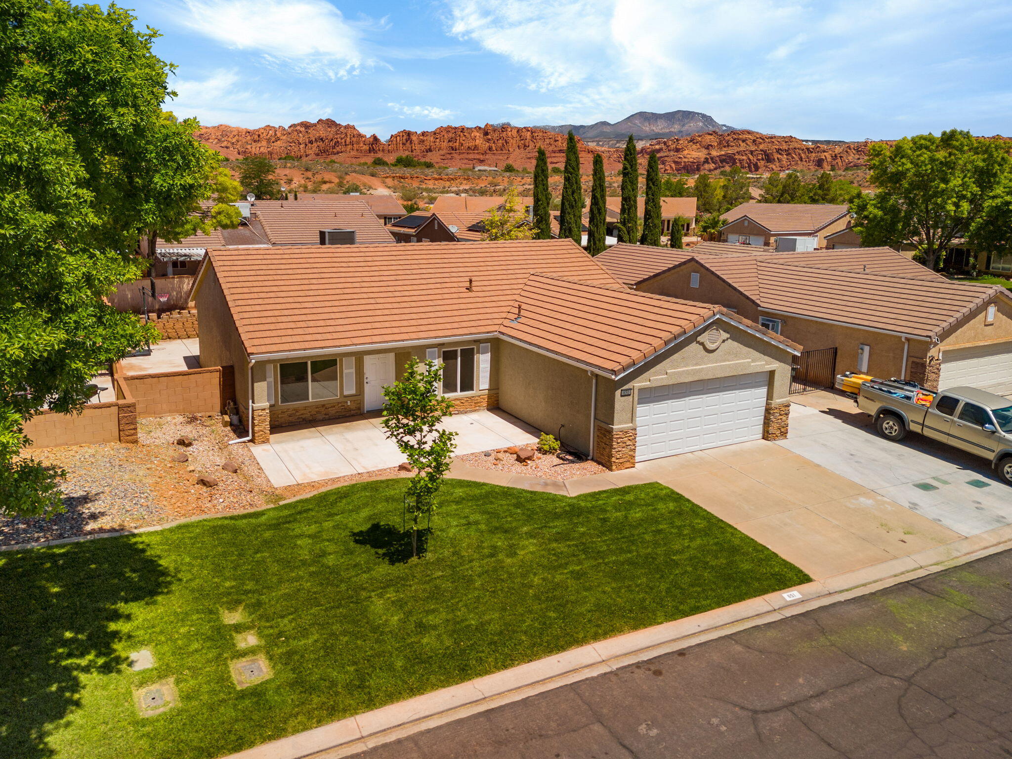 Move-in ready and packed with valuable upgrades, this hard-to-find 4-bedroom home in the desirable Red Rock Canyon subdivision offers exceptional value in one of Southern Utah's most sought-after locations.
Recent improvements include a new HVAC system, new water main, new dishwasher, range, and hood, plus exterior flatwork designed to improve drainage--providing peace of mind and reducing future maintenance expenses. Fresh interior paint and new carpet make the home feel clean, bright, and ready for its next owner.

Enjoy breathtaking Red Mountain views, easy access to outdoor recreation, and a location that perfectly captures the Southern Utah lifestyle. Just minutes from Gubler Park, the Ivins Desert Labyrinth trailhead, Tuacahn Center for the Arts, Black Desert Resort, and Snow Canyon State Park, you'll be surrounded by hiking, biking, entertainment, dining, and world-class scenery. **Information deemed reliable but not guaranteed. Buyer to verify all information, including square footage, utilities, rental restrictions, and HOA information, if applicable..