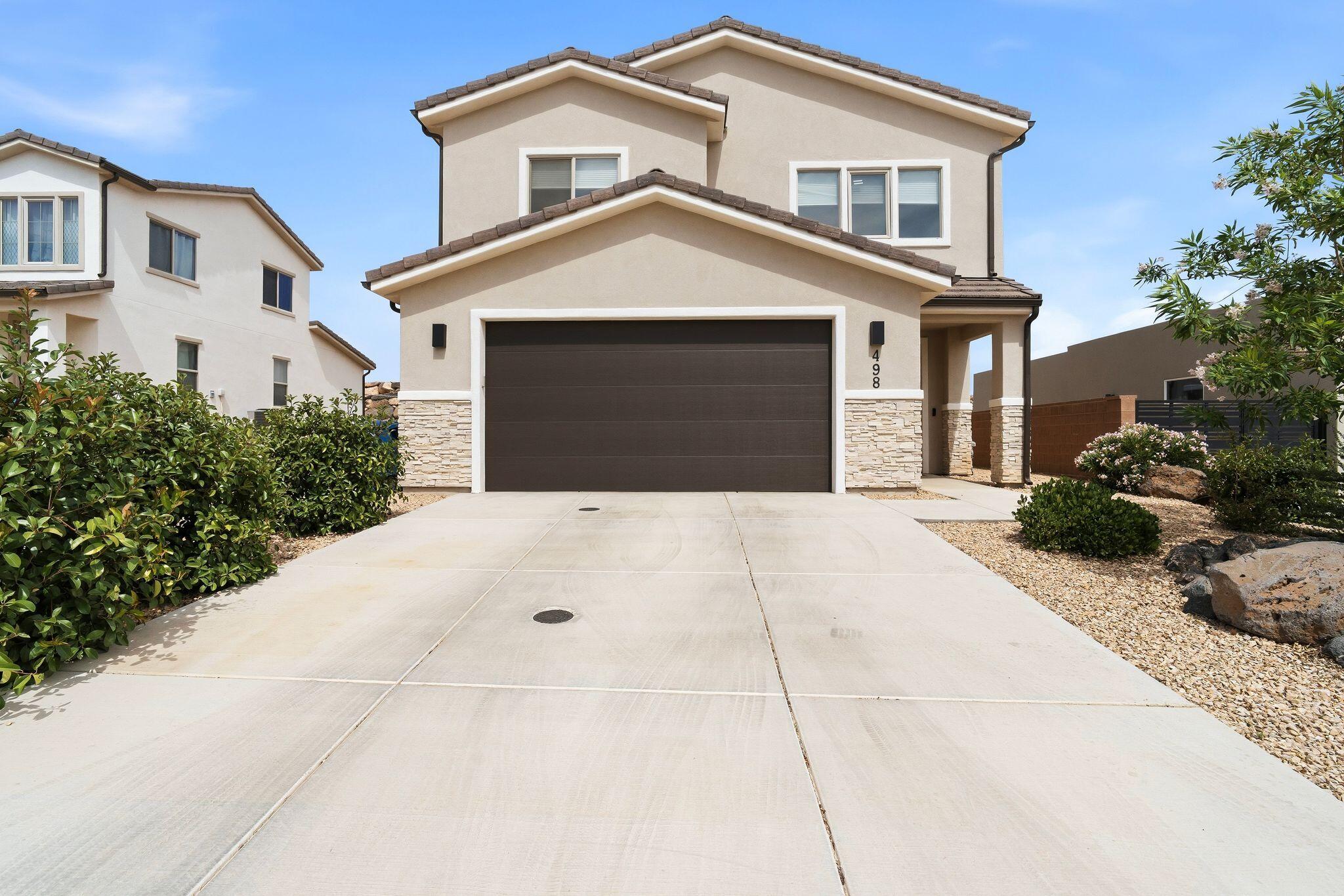 Well-maintained and thoughtfully designed, this beautiful home offers the perfect combination of comfort, functionality, and outdoor adventure in a prime location with NO HOA. The spacious open floor plan is filled with abundant natural light and features mountain views and tall, vaulted ceilings on the upper level, creating an airy and inviting atmosphere. You'll love the generous storage throughout, including large closets, and a deep garage that comfortably accommodates a full-size truck, with a 220V outlet ready for an EV charger. Outside, the low-maintenance landscaping and covered patio provide the perfect space to relax or entertain. Adding to the home's versatility is ample RV parking with full hookups for power, water, and sewer, offering exceptional convenience and flexibility. Conveniently located near multiple parks, restaurants, and endless recreation opportunities, this home puts the best of Southern Utah living right at your doorstep. Buyer to verify all information, deemed reliable, however buyer to verify all info including utilities, rental restrictions, and HOA information if applicable.