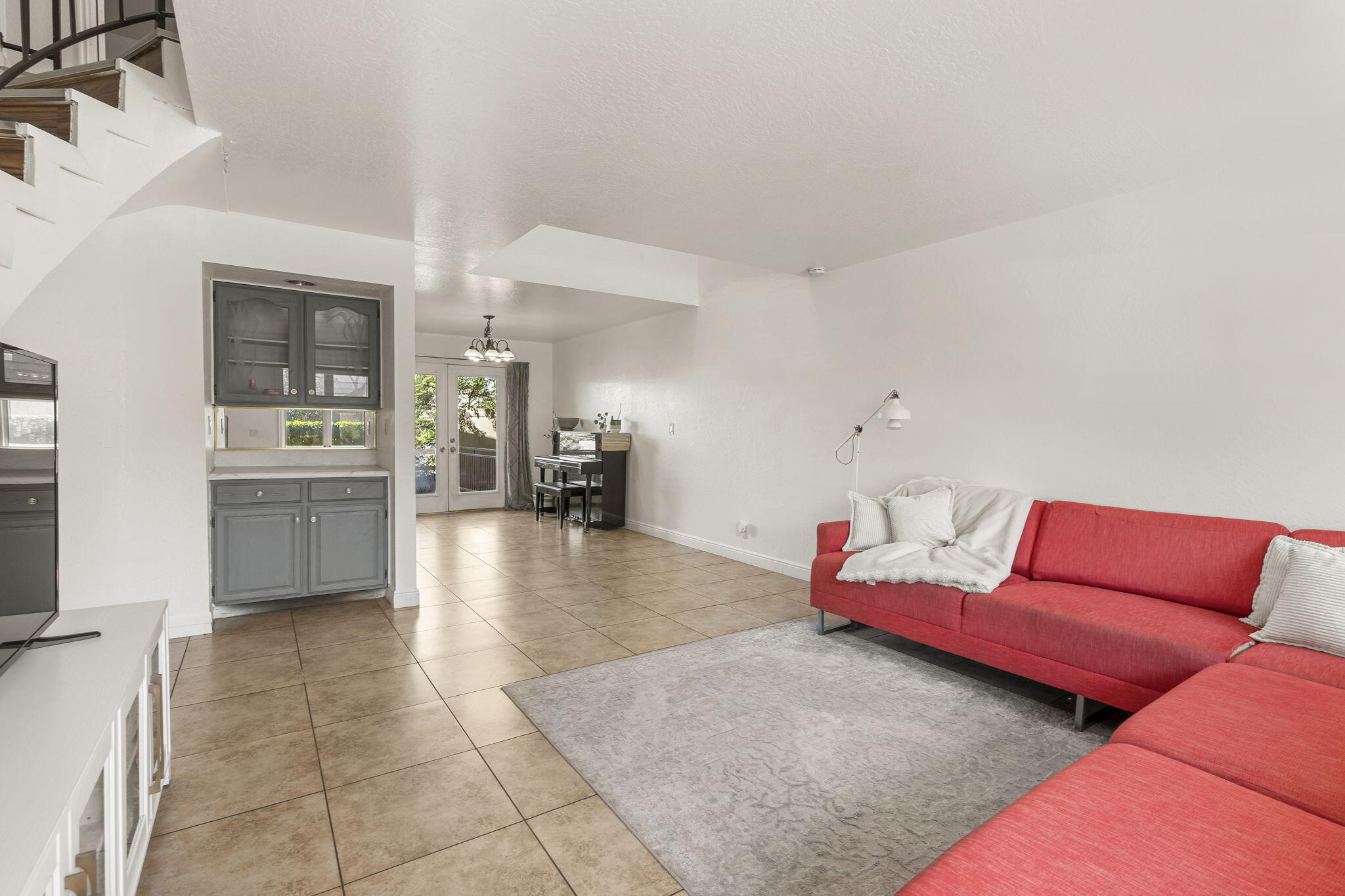 This charming St. George townhome offers 3 bedrooms, 2.5 bathrooms, 1,822 sq. ft. of comfortable living space, and the convenience of an attached two-car garage. Recent improvements include fresh interior paint and beautifully painted kitchen cabinets, creating a bright, updated feel throughout. The open floor plan is perfect for everyday living and entertaining, while the private backyard provides a peaceful space to relax and enjoy the views. Conveniently located near shopping, dining, parks, and other everyday amenities, this home is ideal as a primary residence, second home, or investment opportunity. Don't miss your chance to make it yours!
