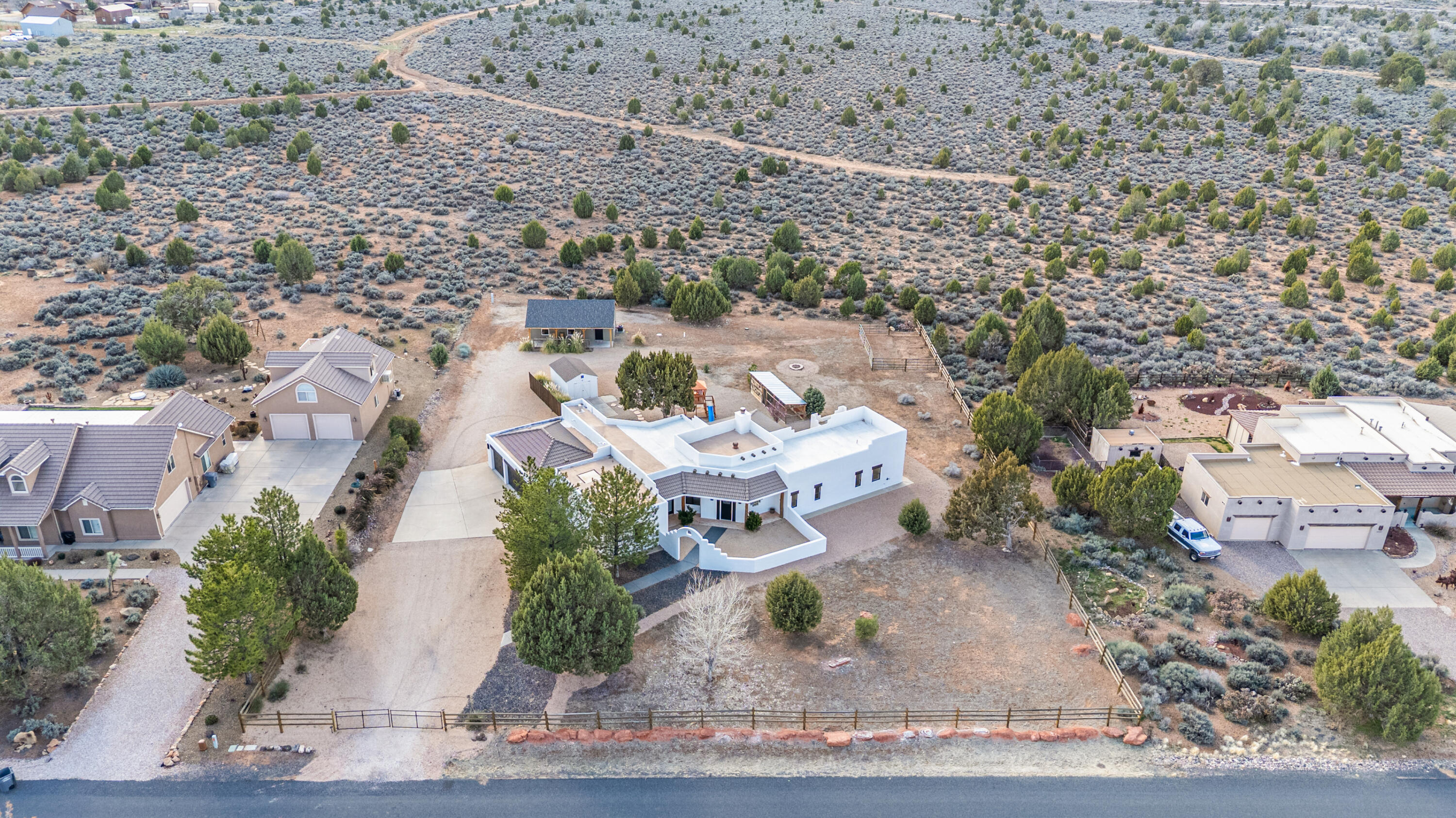 Welcome to this rare .99-acre horse property featuring a spacious main home and an income-producing ADU built in 2022, backing directly to 250+ acres of state-owned land with unobstructed views, added privacy, and direct access to open space. With horse rights, a corral, chicken coop, storage shed, backup generator, and a versatile ADU ideal for rental income, guest quarters, or multigenerational living, this property offers a hard-to-find combination of acreage, flexibility, and rural lifestyle appeal in Southern Utah.

The main home offers an updated kitchen, modern finishes, thoughtfully designed lighting throughout, and a fireplace that adds warmth and character to the living space. Located less than 3 miles from Upper Sand Cove, this property provides quick access to riding trails, outdoor recreation, and scenic desert landscape while still being conveniently close to town amenities. A unique opportunity for buyers seeking horse property, land, privacy, and added income potential all in one.