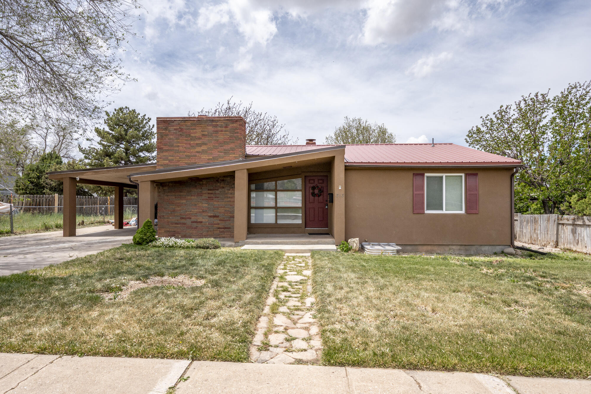 Nestled in the heart of Cedar City, this quaint, timeless, and exceptionally well-cared-for home offers charm, comfort, and convenience all in one. Ideally located within walking distance to schools, shopping, and everyday amenities, this 5-bedroom home features engineered hardwood flooring, granite countertops, stainless steel appliances, and even a newer washer and dryer. The durable stucco and brick exterior paired with a metal roof create low-maintenance, worry-free living. Enjoy mature apple and walnut trees, a cozy backyard fire pit, new windows in several rooms, a wood stove, new furnace, and even a new sewer line to the street. Whether you're looking for a primary residence, investment property, vacation rental, or student housing opportunity, this versatile home is a must-see!