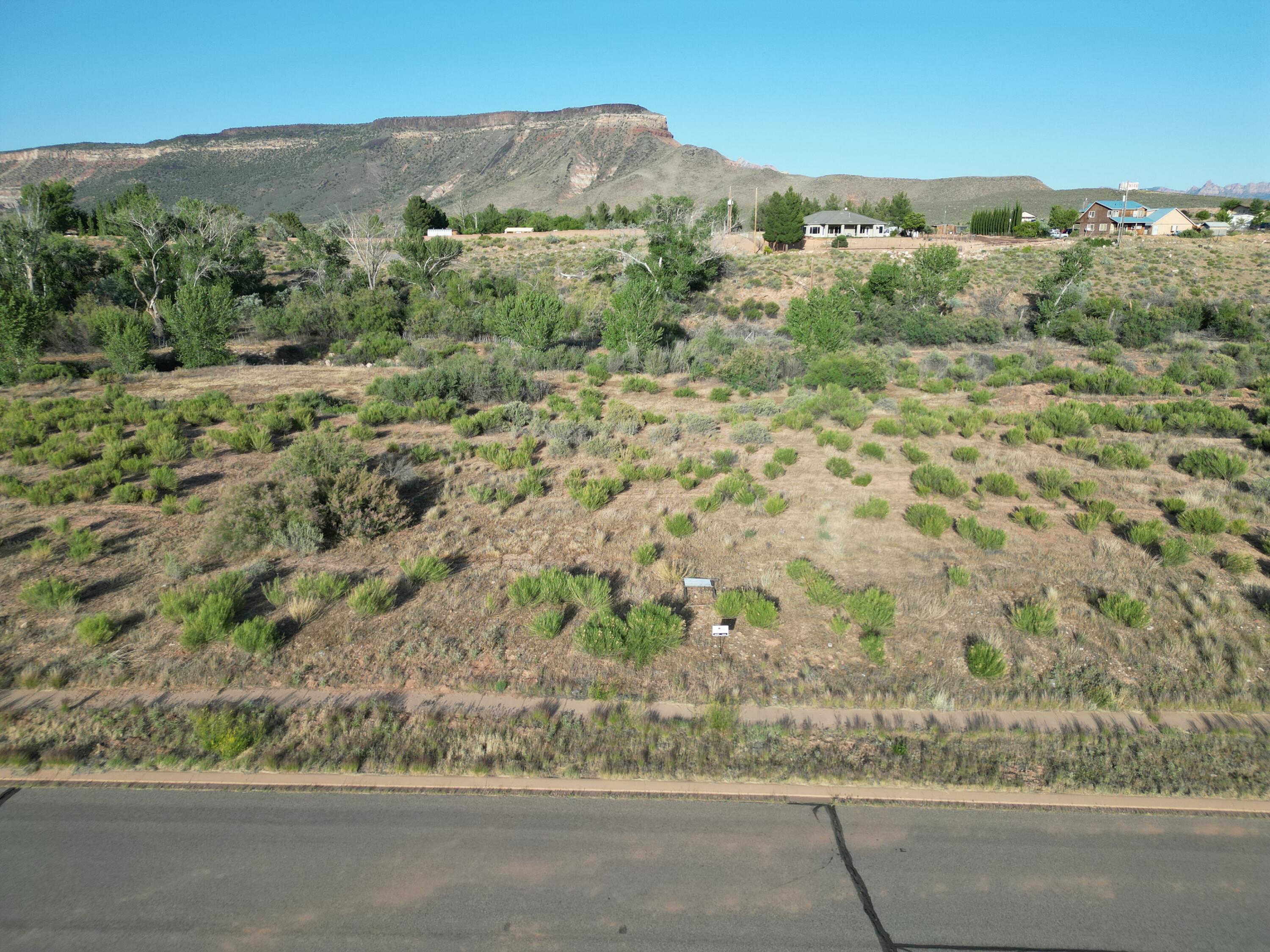 New Release Phase 2 - Premium 1+ Acre Lots Now Available! Visit our brand-new sales office at Sierra Bella in Virgin, Utah, just minutes from the entrance to Zion National Park. This is your opportunity to own a slice of Southern Utah paradise! These fully improved 1+ acre homesites offer breathtaking views of the iconic Zion mesas and a rare rural residential setting--perfect for building your custom dream home. With approved builders ready to go, you can begin the building process right away. Each lot includes: One share of pressurized irrigation water Culinary water connection Fully improved homesite Washington County Water Conservancy impact fees already paid Prices start at just $305000. Don't miss this limited opportunity to secure your place in one of Southern Utah's most desirable communities. All information is deemed reliable but not guaranteed. Buyer is responsible for verifying all information.