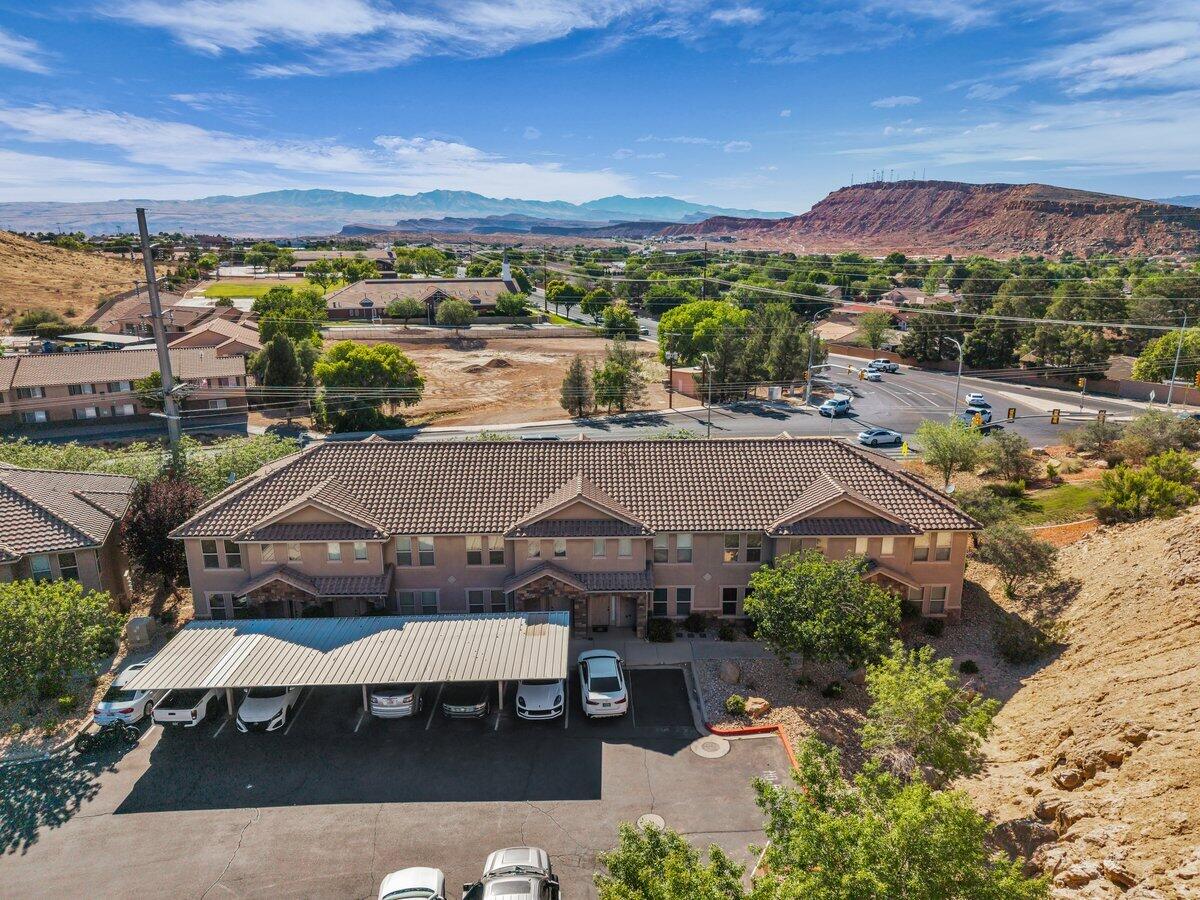 Whether you're searching for your very first home, investment property, or the perfect getaway retreat in sunny Southern Utah, this beautifully maintained townhome is an incredible opportunity! Nestled in a highly desirable community, this spacious and spotless home has been lovingly cared for by only two owners and truly shows pride of ownership throughout. Inside, you'll find a thoughtfully designed open floor plan with generous living spaces, modern upgrades, abundant natural light, and a warm, inviting atmosphere that instantly feels like home. Residents enjoy access to fantastic community amenities including a sparkling outdoor pool and clubhouse, perfect for relaxing and entertaining. Step outside to soak in the breathtaking mountain views and stunning desert landscapes that make Southern Utah so special. Ideally located near Zion National Park, Snow Canyon State Park, hiking, biking, golf, and endless outdoor adventures, this home offers the perfect combination of comfort, lifestyle, and year-round recreation. Not zoned for nightly rentals. Buyer to verify all information, deemed reliable; however, buyer to verify all info including utilities, rental restrictions, and HOA information if applicable.