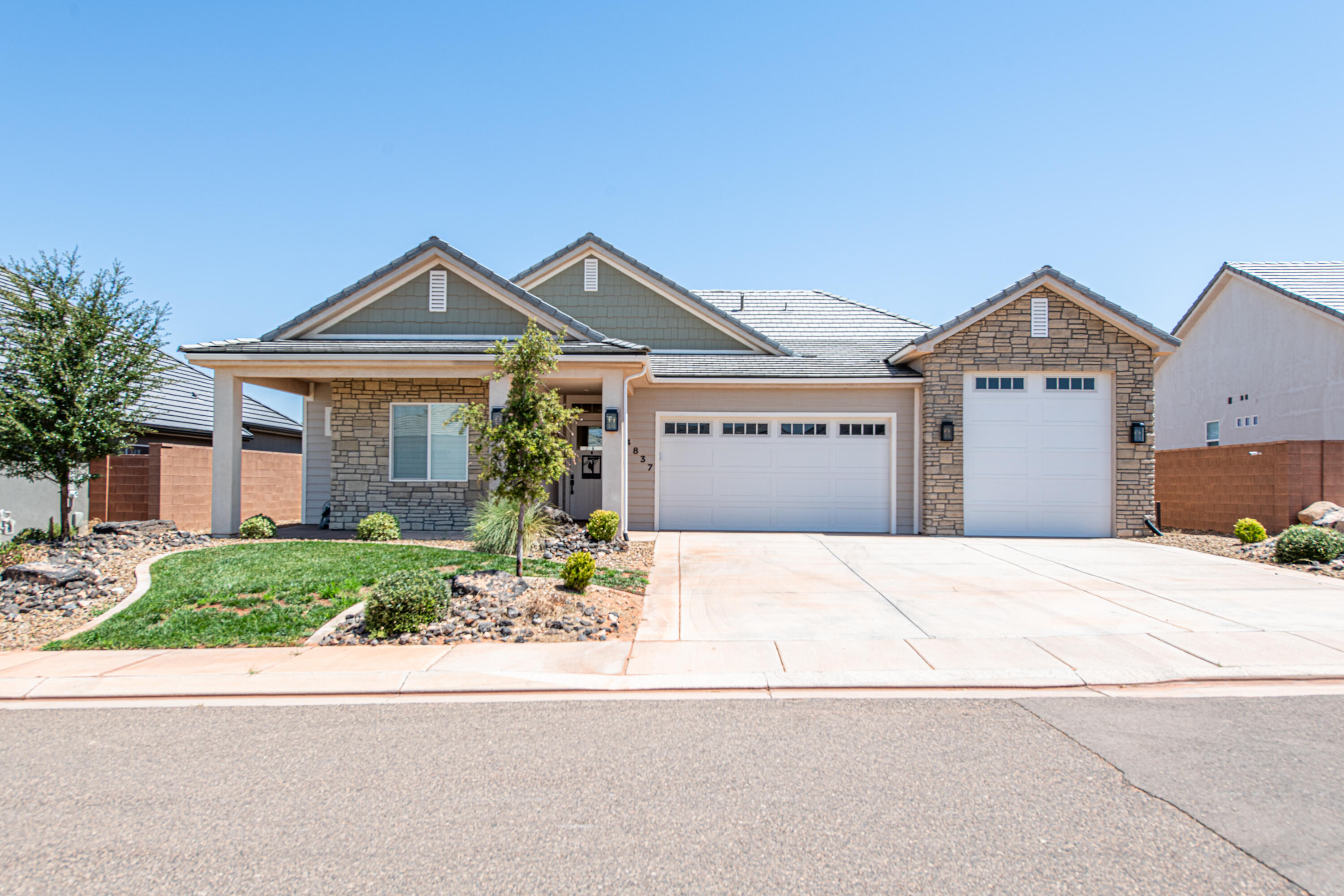Located in a sought-after and growing area, this barely lived-in 3-bedroom, 2-bathroom home built in 2022 offers comfort, convenience, and stunning mountain views. The open floor plan is perfect for modern living, while the attached 40-foot boat garage provides ample space for your toys or storage needs. Enjoy access to a beautiful HOA clubhouse complete with a fitness and event center--ideal for relaxing or entertaining. Whether you're looking for a primary residence or a second home near outdoor adventures, this property blends fresh construction with a serene, community-focused lifestyle. Don't miss this rare opportunity!