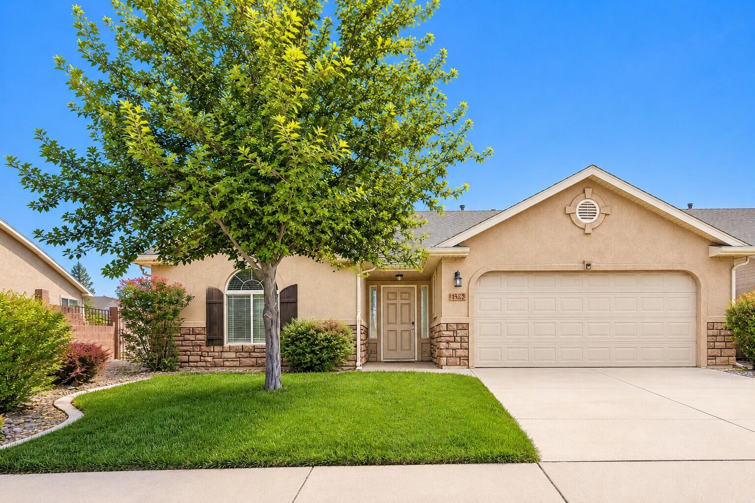 Private backyard, mature trees, mountain views, single-level living and direct access to walking paths.