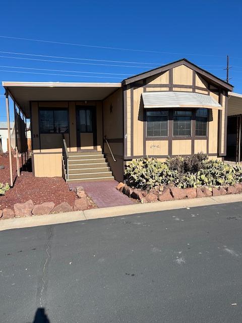 Seller is Motivated!  (Manufactured Home on Rented Lot in a 55+ Adult Community) Cozy and well-maintained two-bedroom, two-bath home nestled in a clean and quiet park. Enjoy an inviting open layout with bright, comfortable living spaces that instantly feel like home. This beautifully remodeled kitchen features stunning cabinetry, upgraded countertops, and gorgeous flooring throughout. Home includes an added sun/bonus room as a bonus. Ideally located near schools, shopping, and dining. HOA fee is $320 per month offering an affordable and low-maintenance lifestyle in a lovely community. Buyer to verify all information.